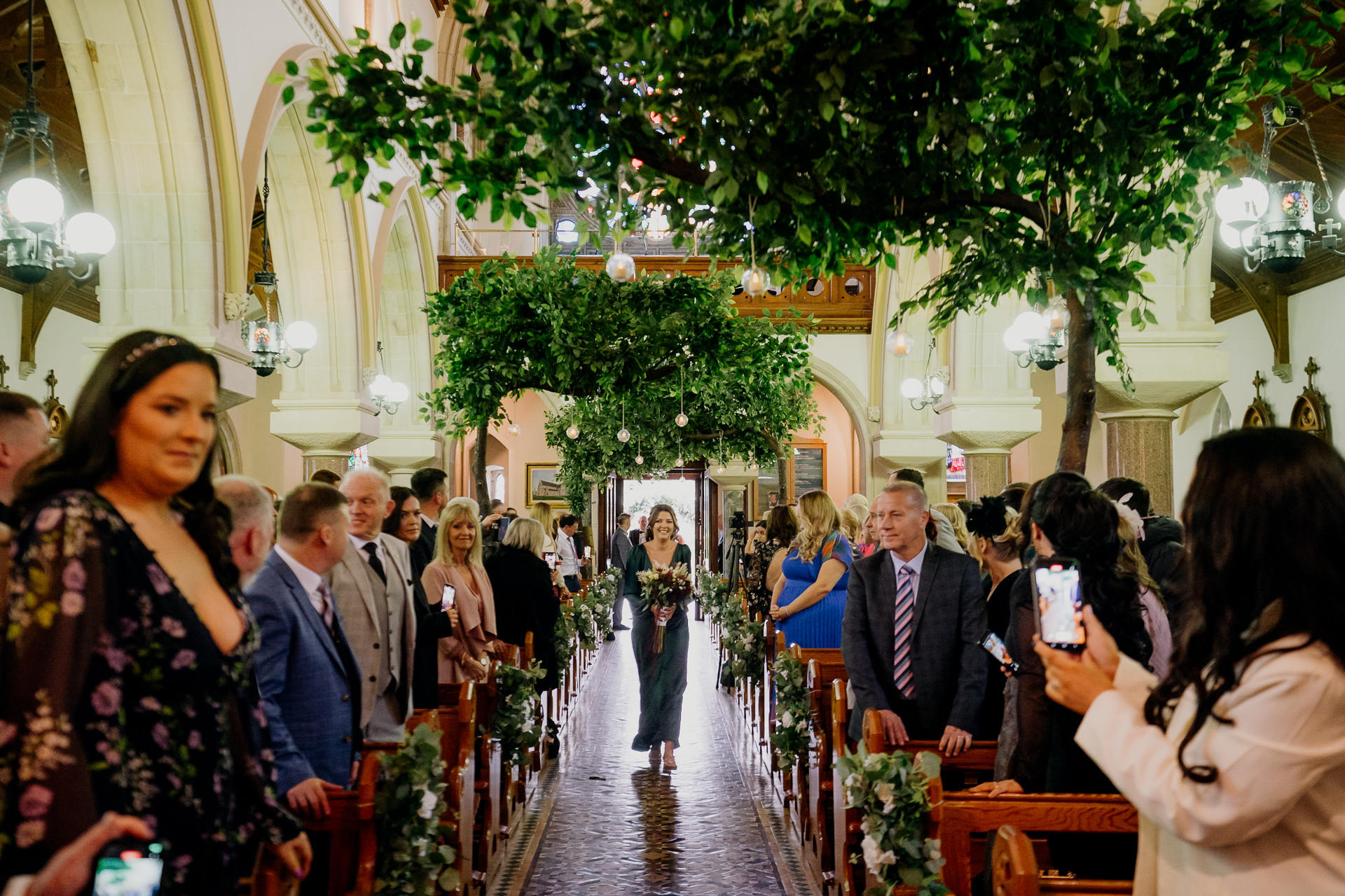 A group of people in a hall