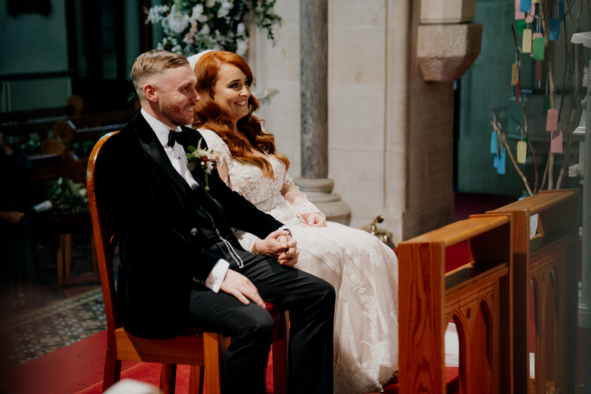 A man and woman sitting on a bench