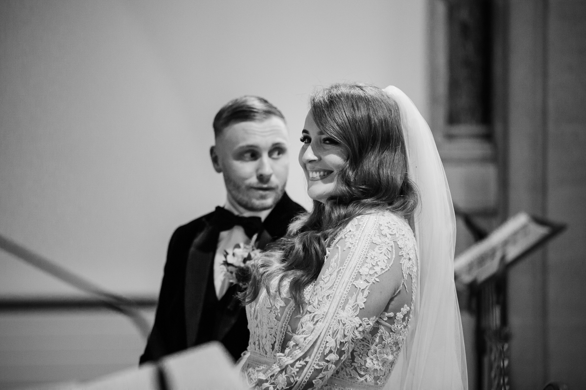 A bride and groom posing for a picture