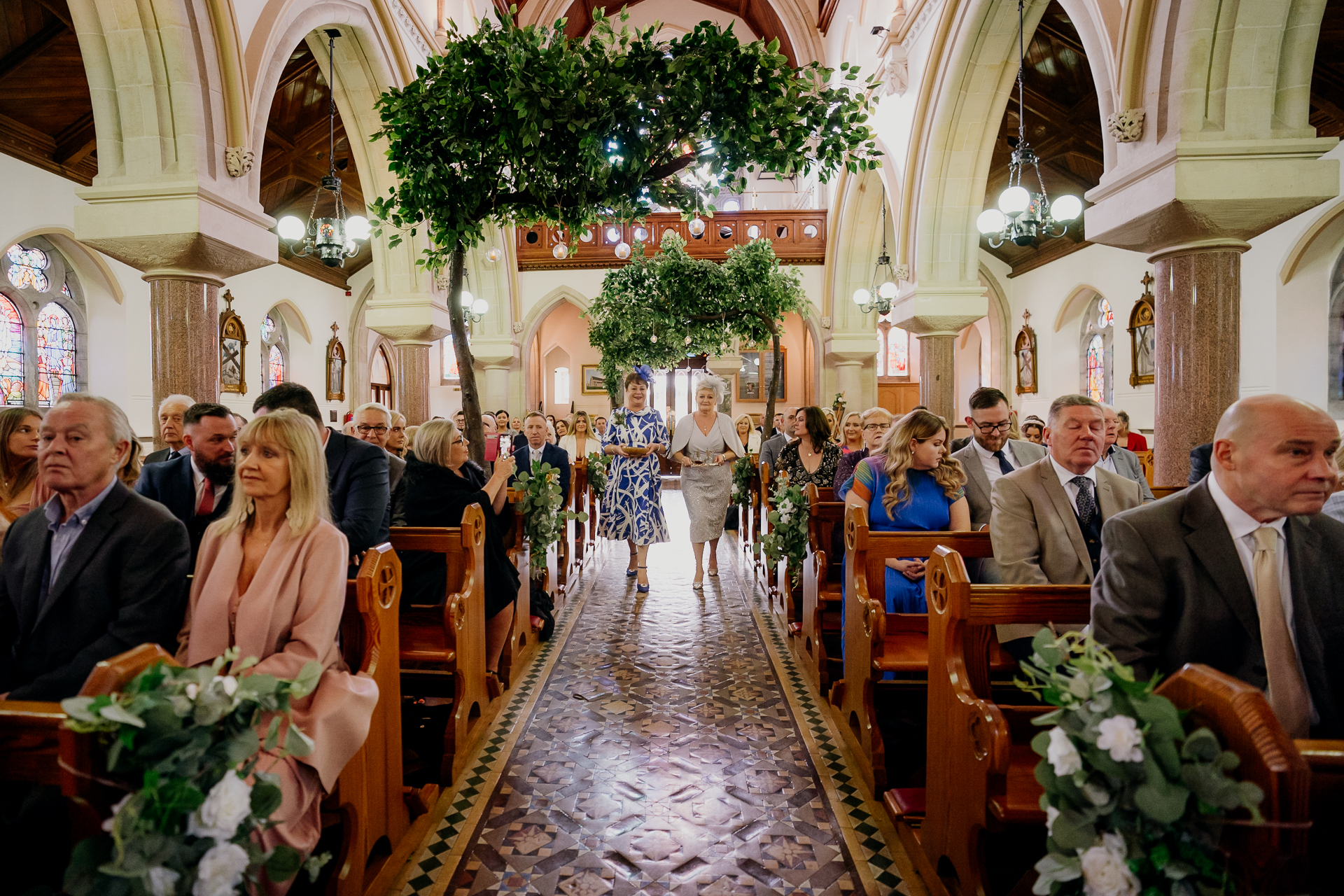 A group of people sitting in a church