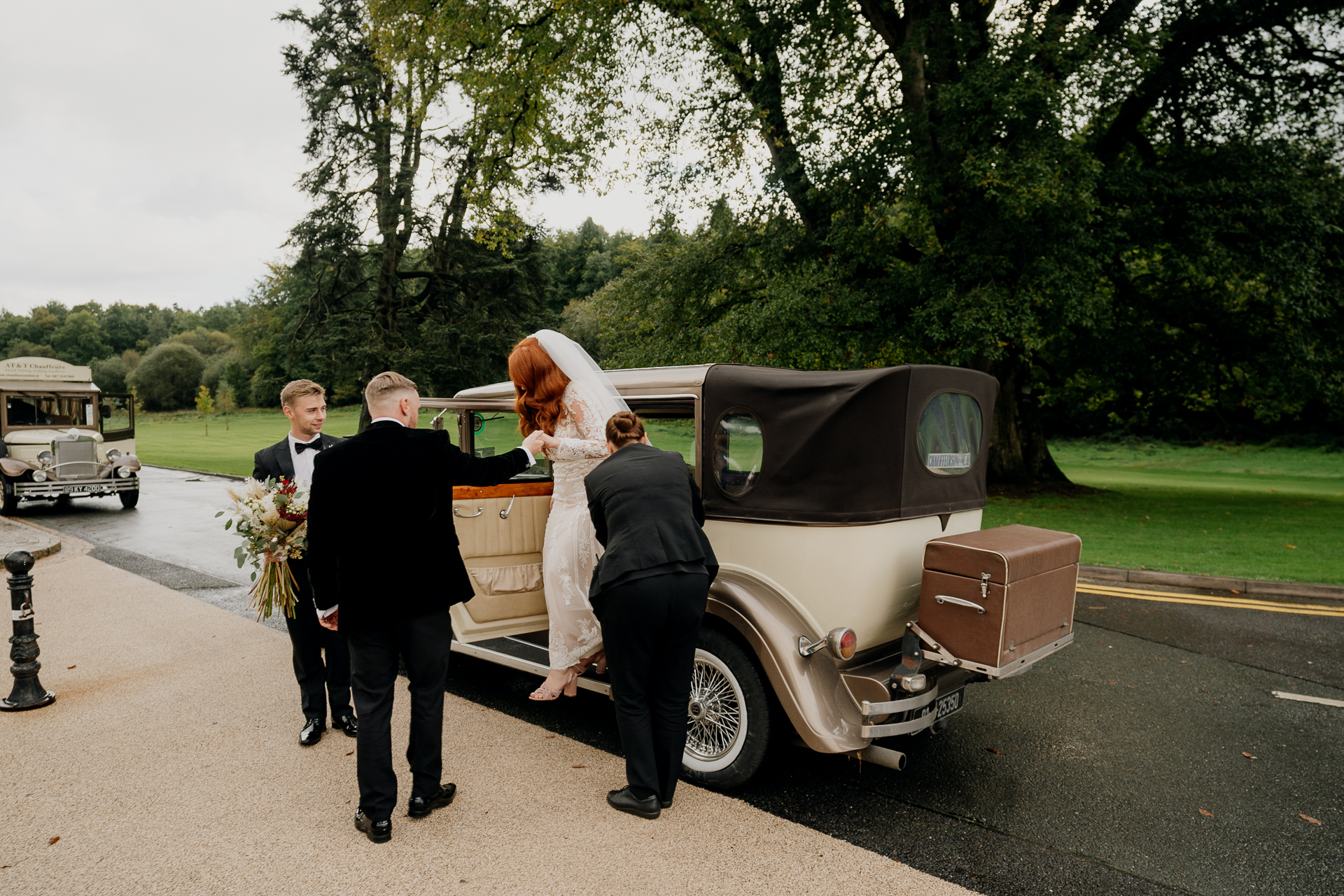 A group of people getting into a van