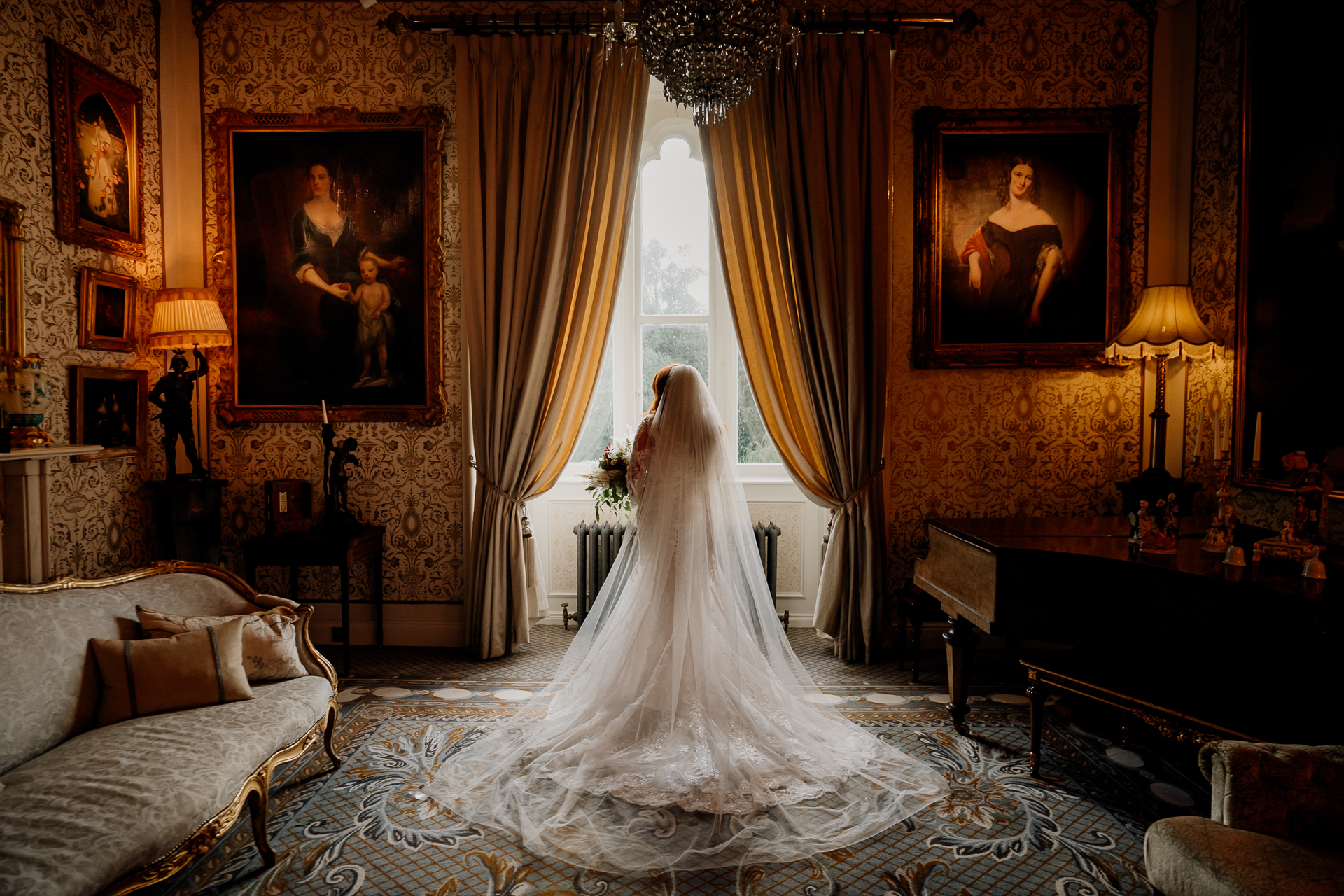 A wedding dress on a bed