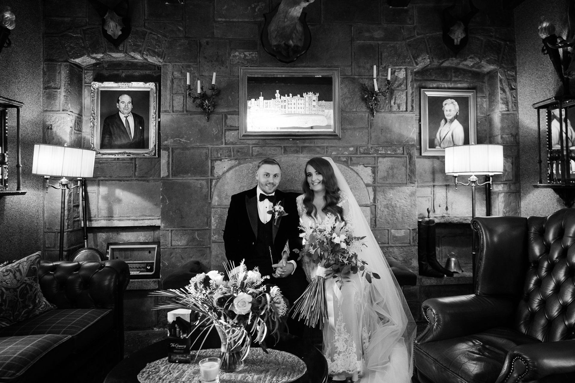 A bride and groom posing for a picture