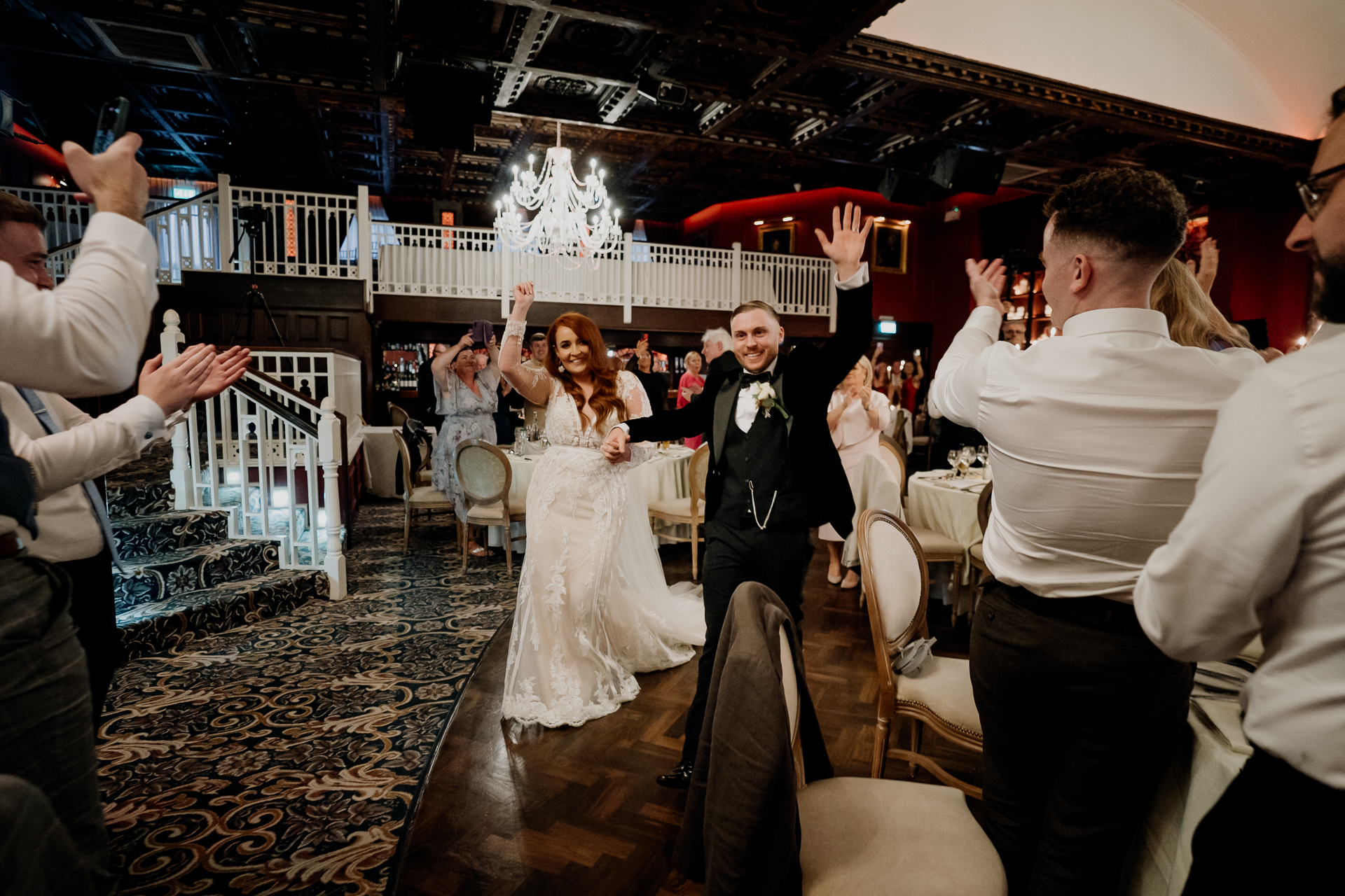 A bride and groom dancing at a wedding reception