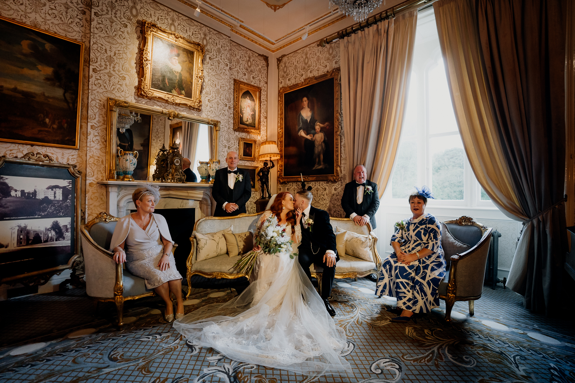 A bride and groom in a fancy room