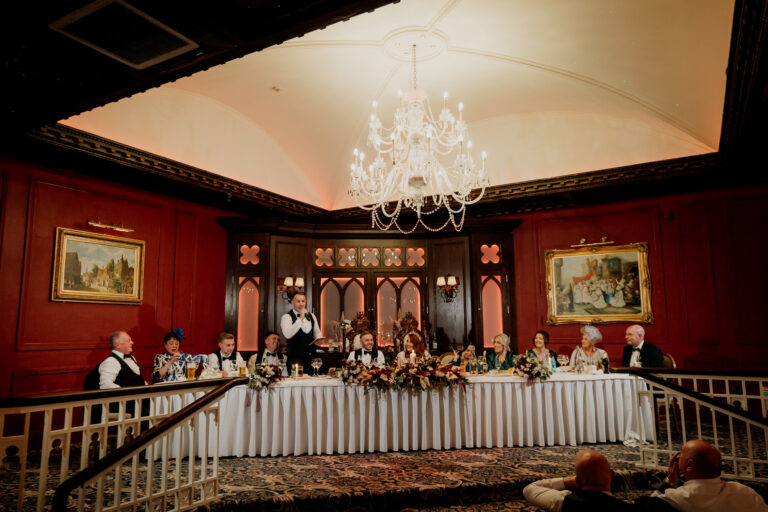 A group of people sitting on a stage