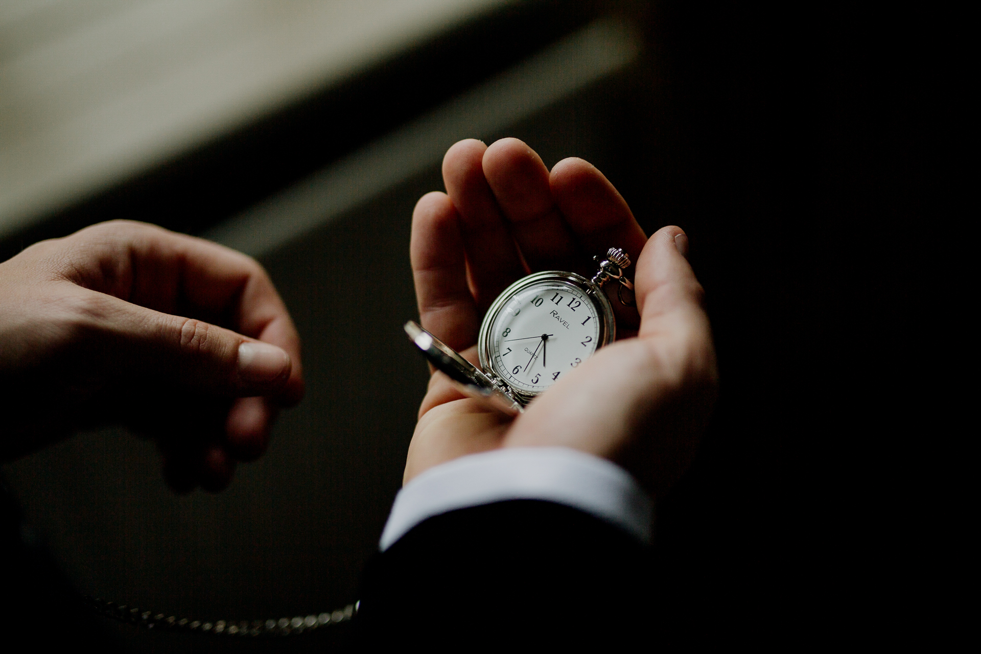 A person holding a watch