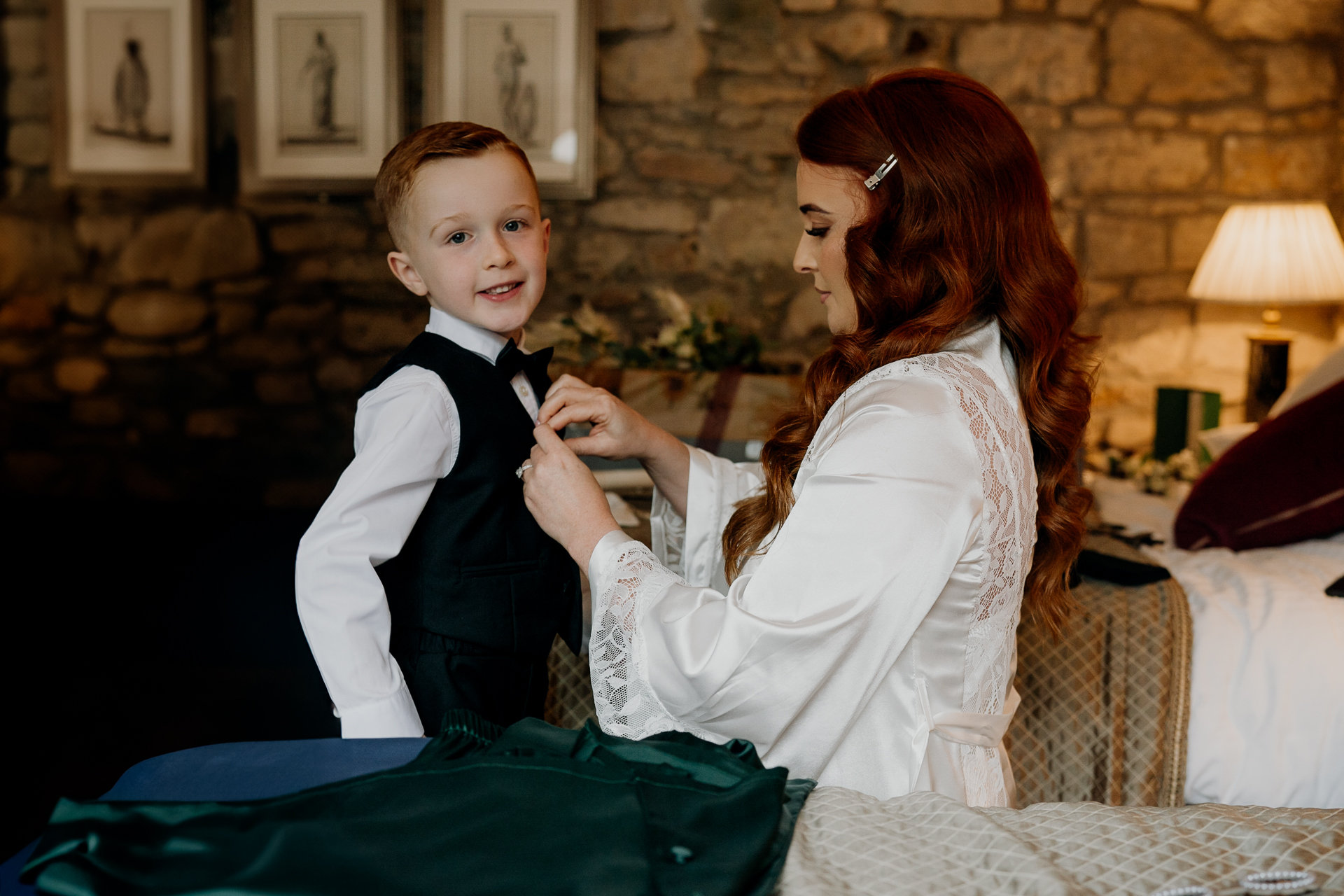 A woman and a boy sitting on a couch