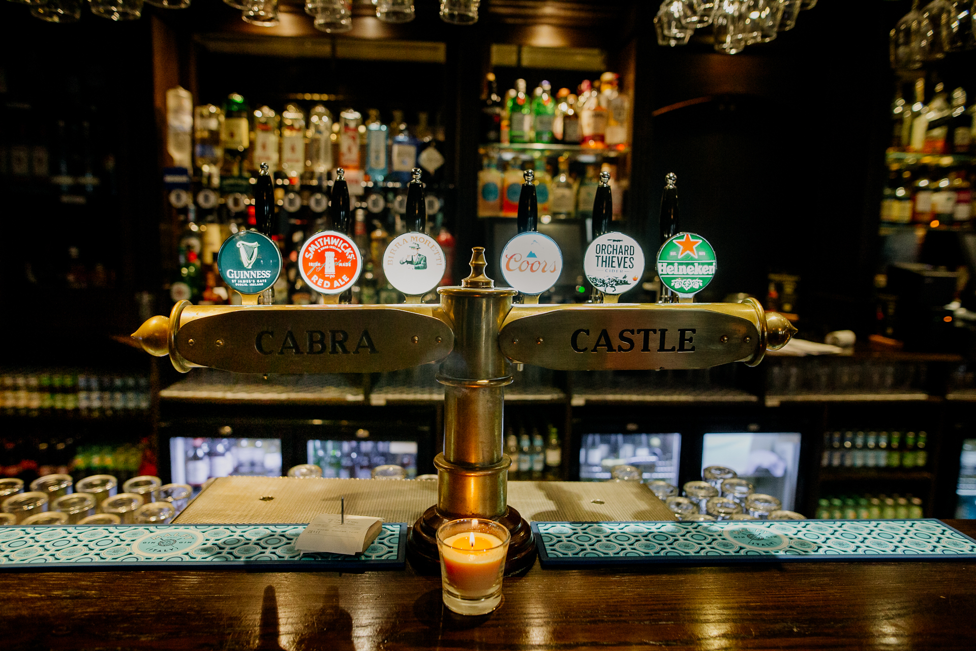 A bar with a glass of beer