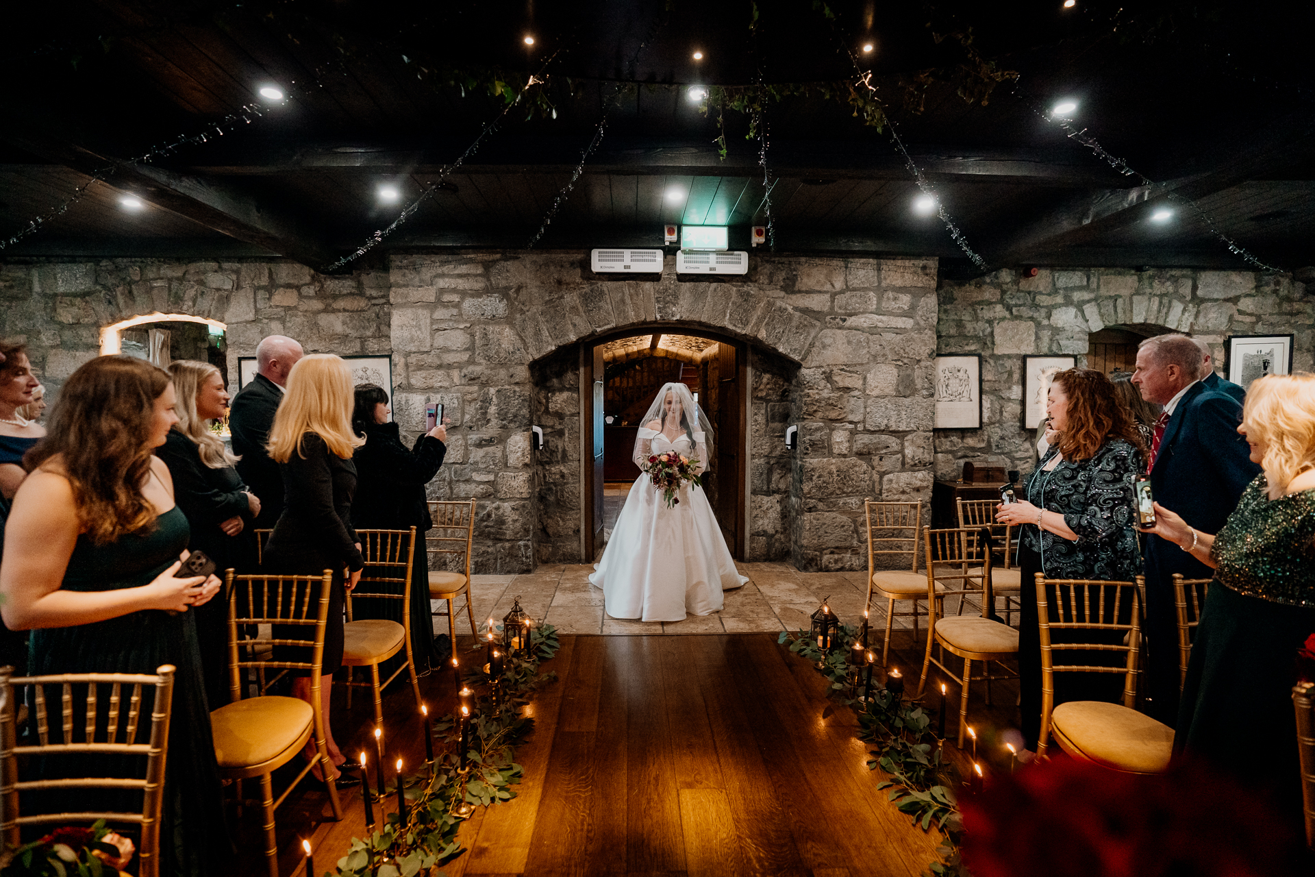 A bride and groom walking down the aisle