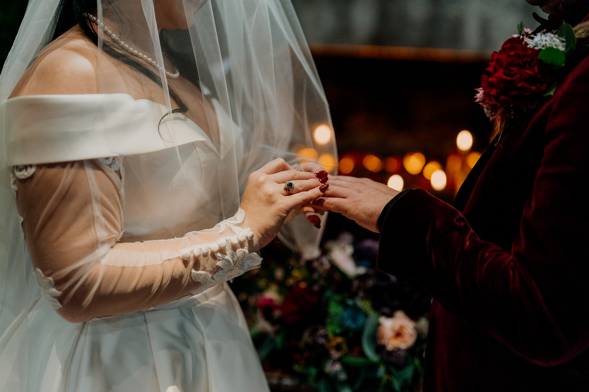 A woman in a white dress and a man in a tuxedo