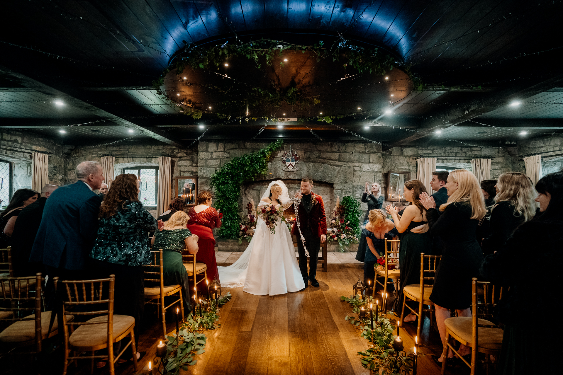 A bride and groom walking down the aisle