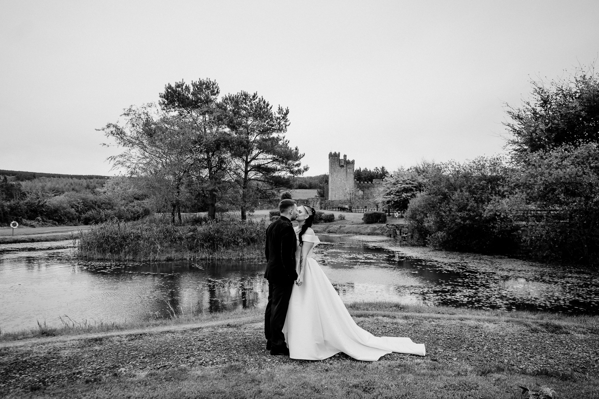 A bride and groom kissing