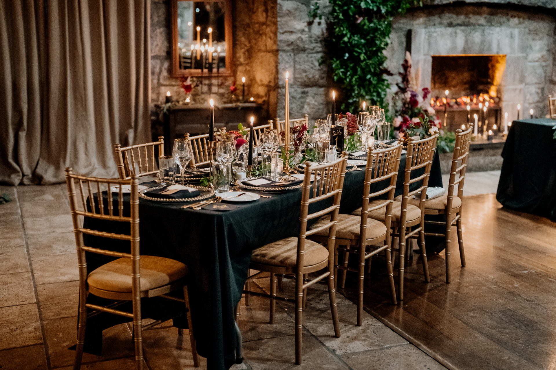 A dining table with a set of chairs around it