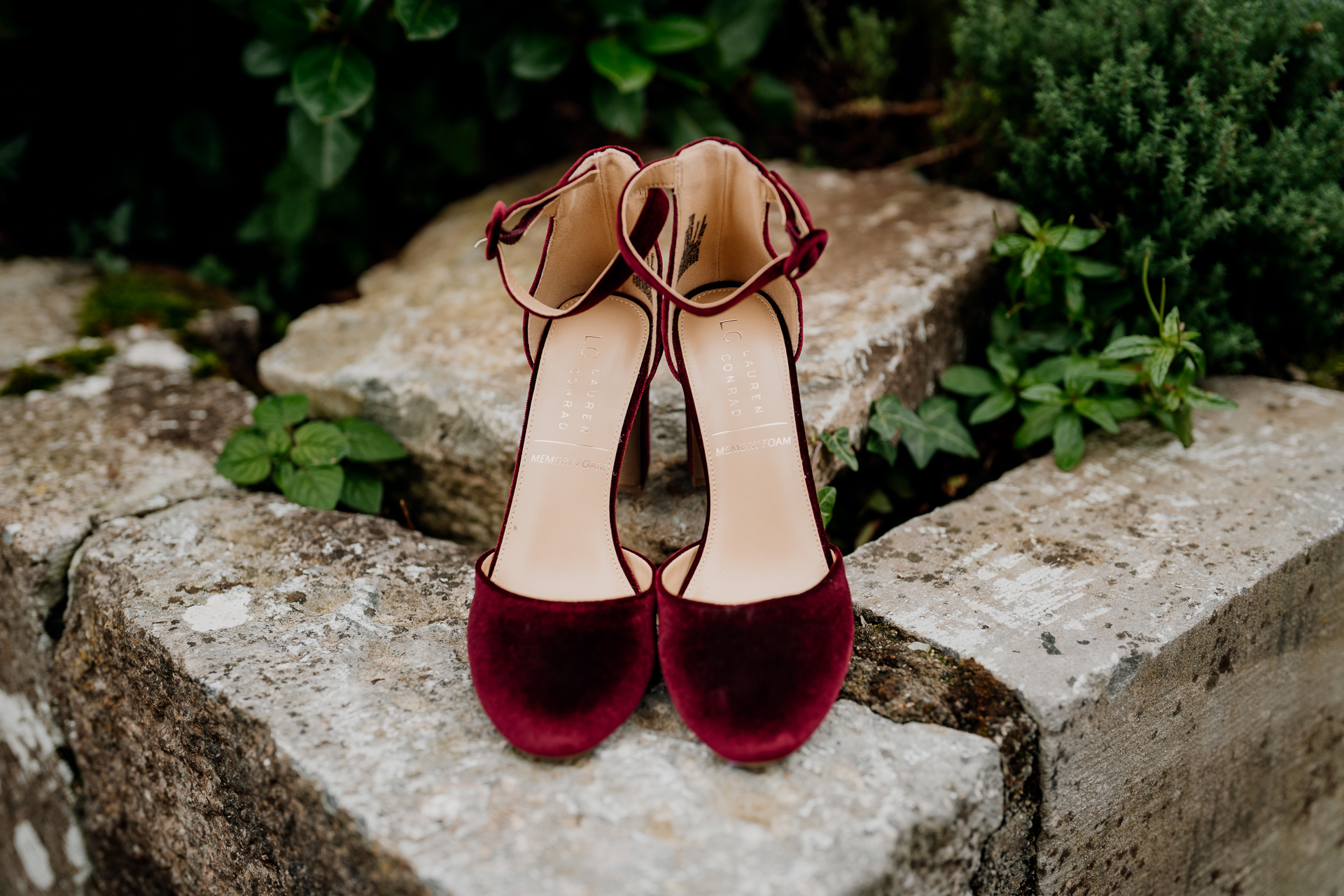 A pair of red shoes on a rock