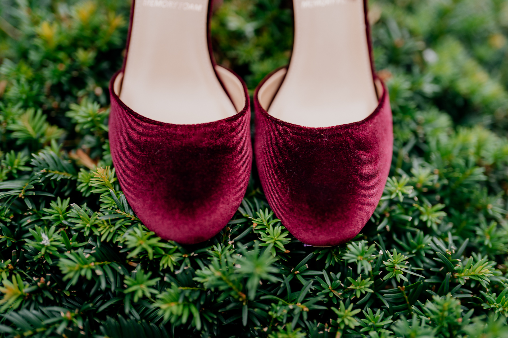 A pair of pink slippers on grass