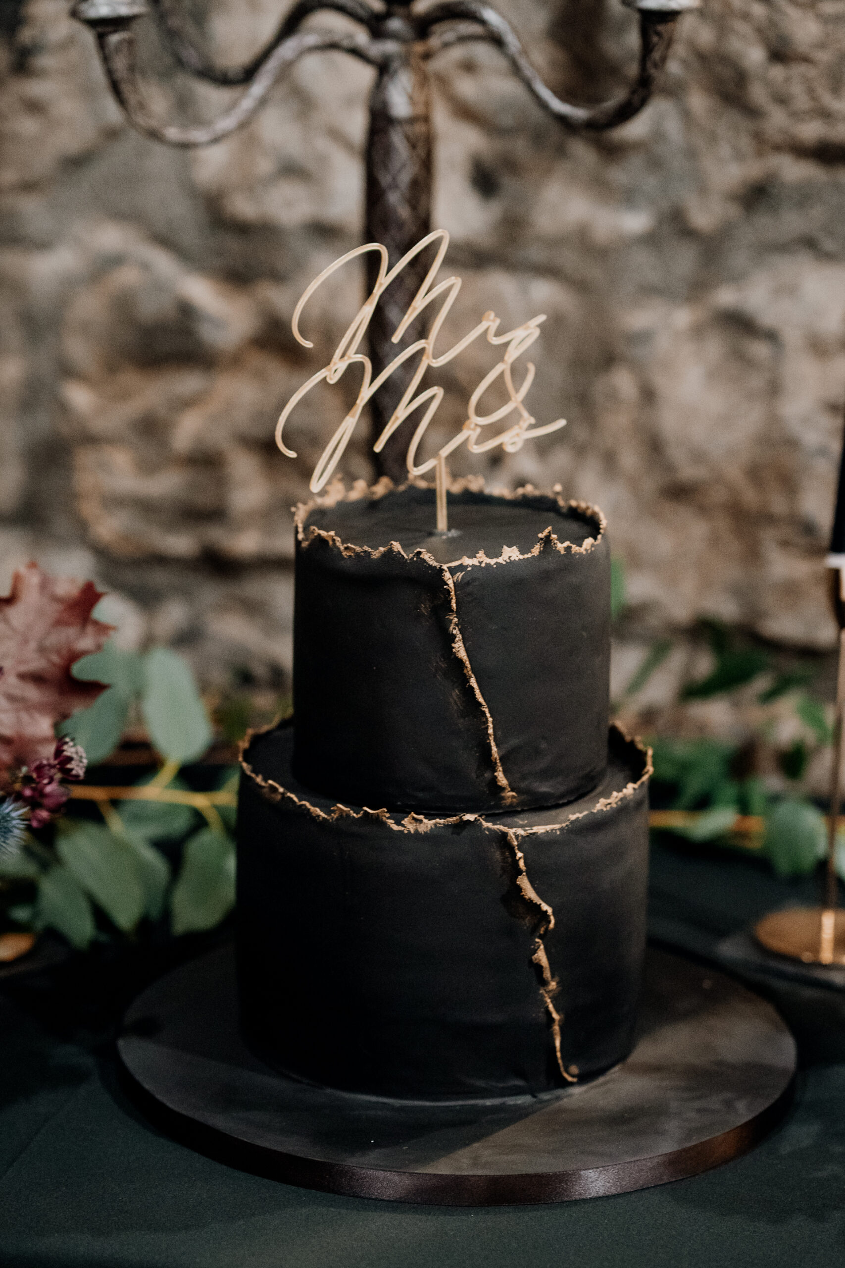 A candle in a glass holder