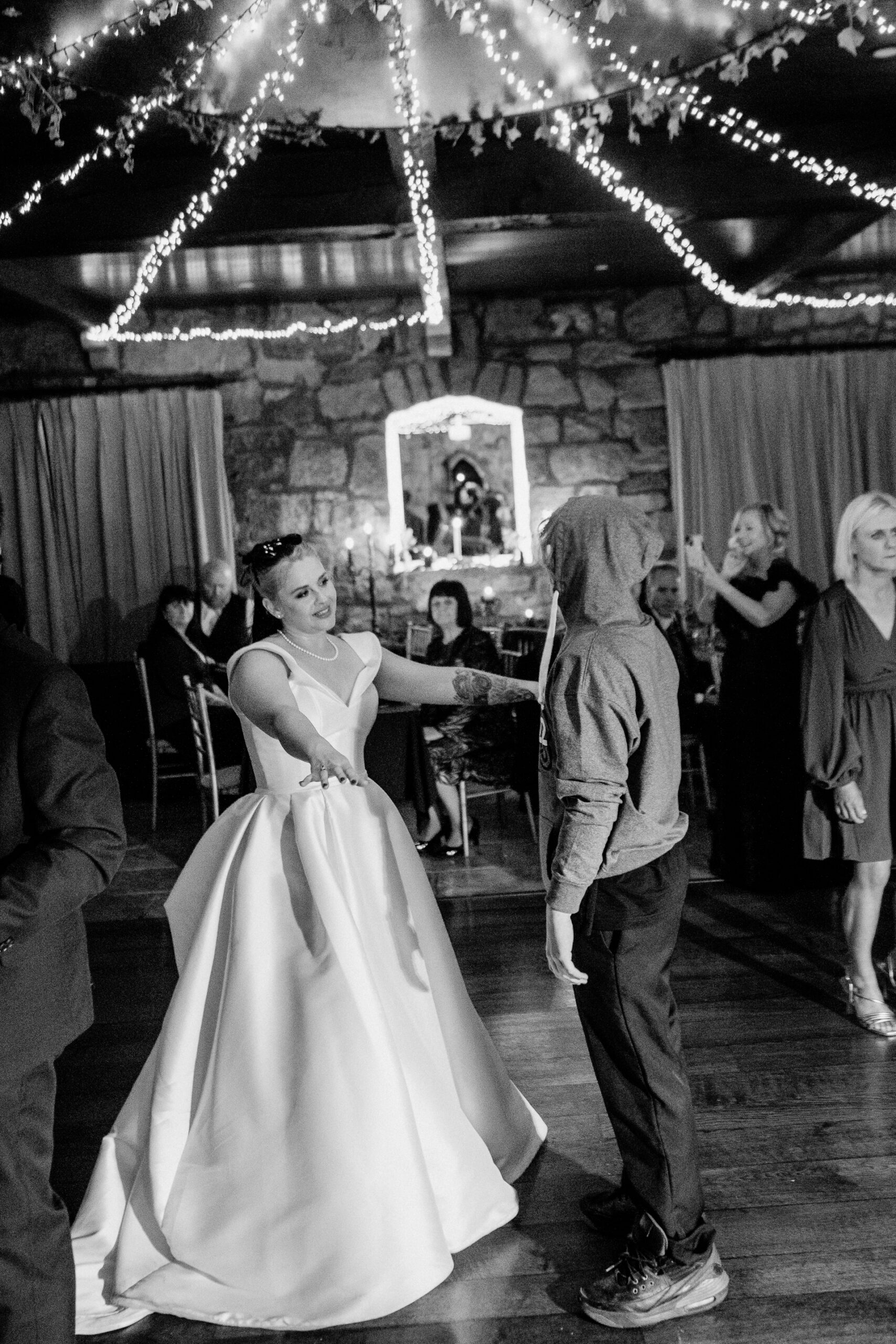 A person in a wedding dress dancing