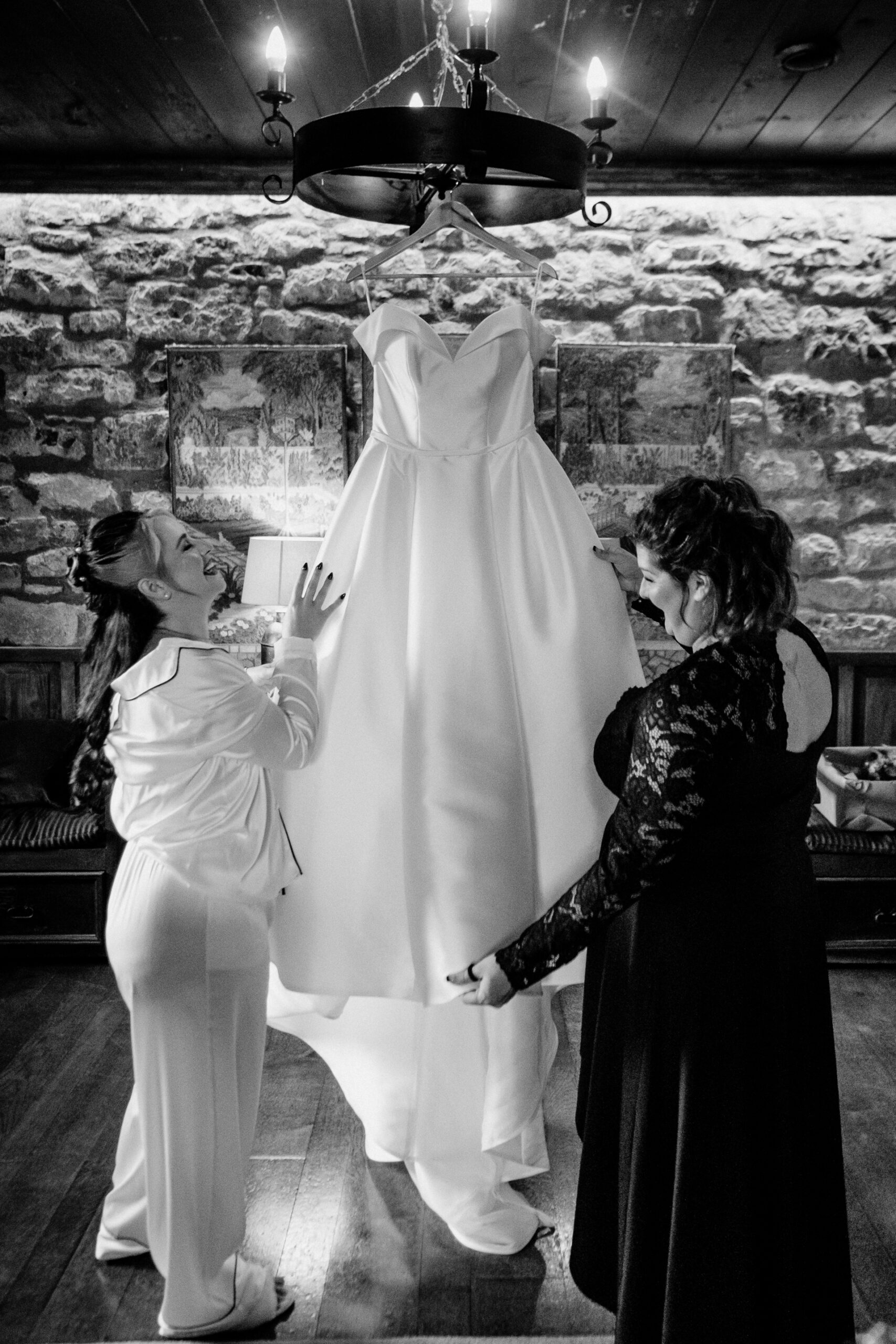 A person getting the wedding dress done