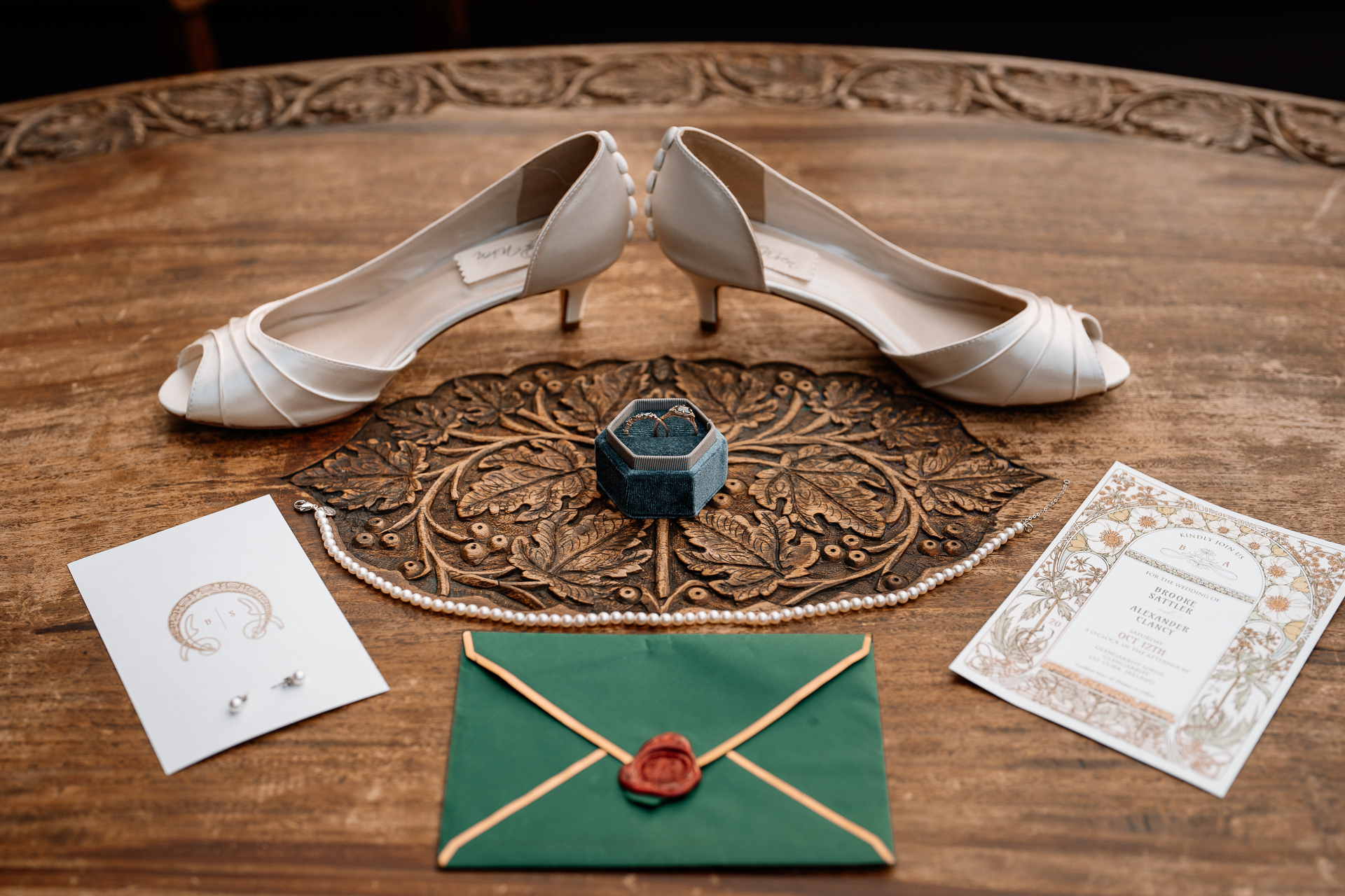 A pair of white shoes on a wooden surface