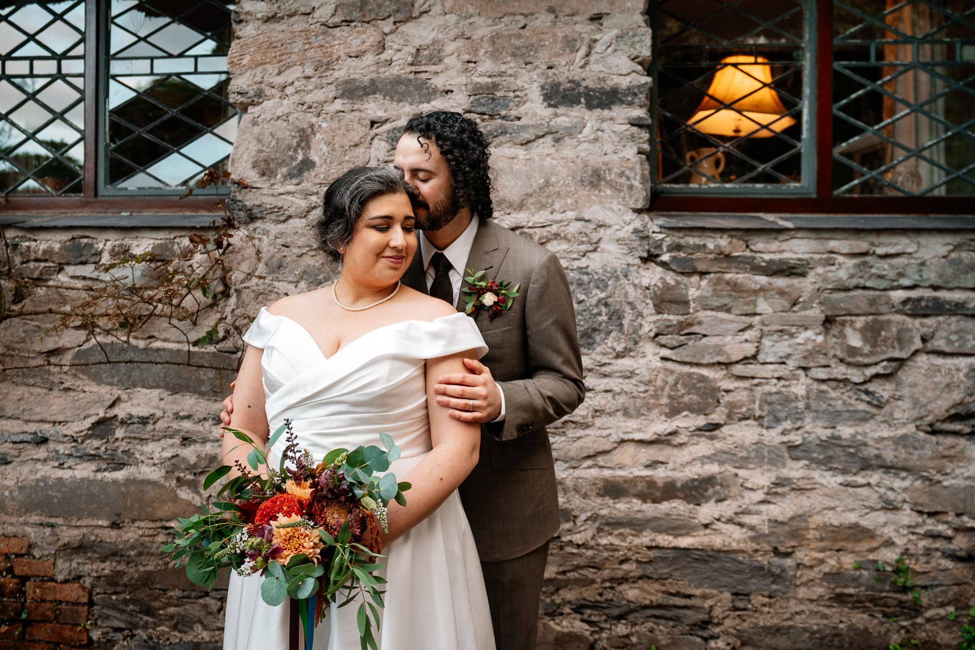 A man and woman posing for a picture