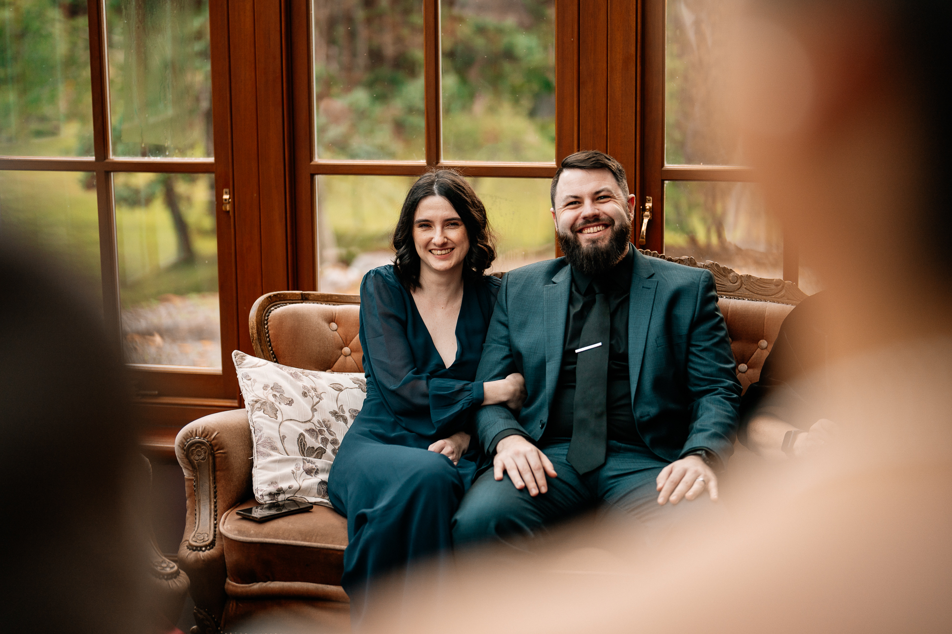 A man and woman sitting on a couch