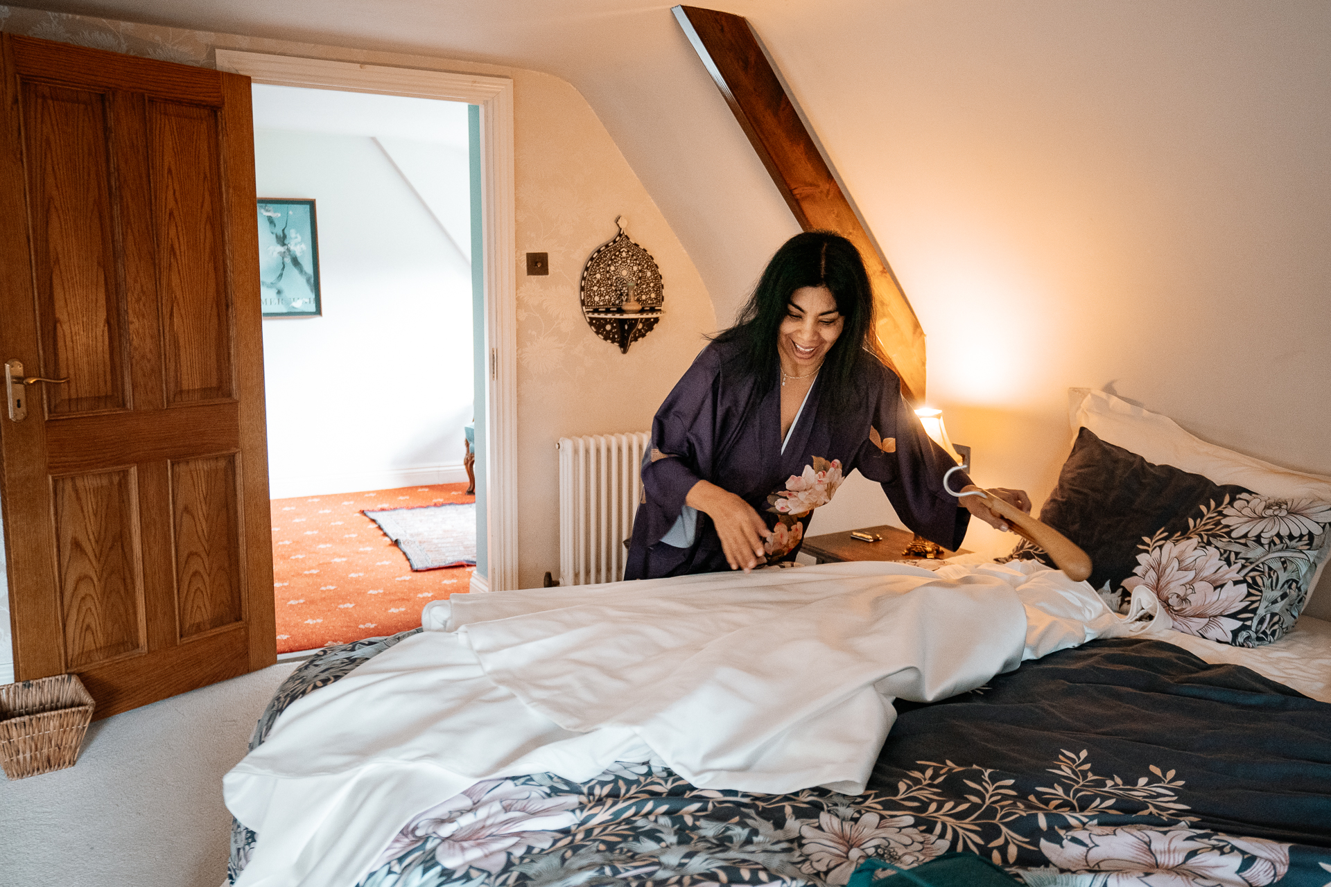 A person sitting on a bed