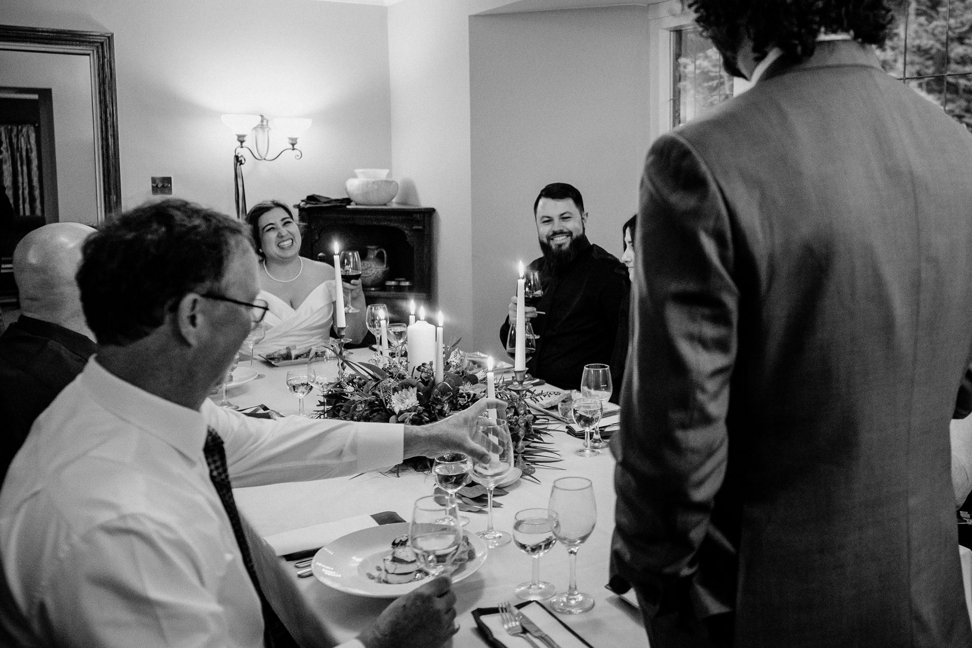 A group of people sitting around a table