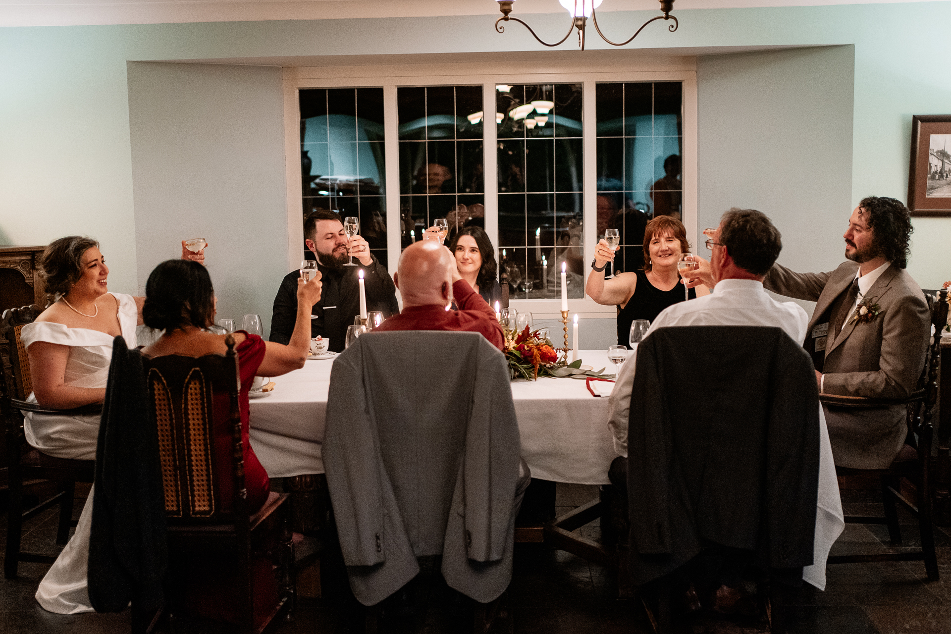 A group of people sitting around a table