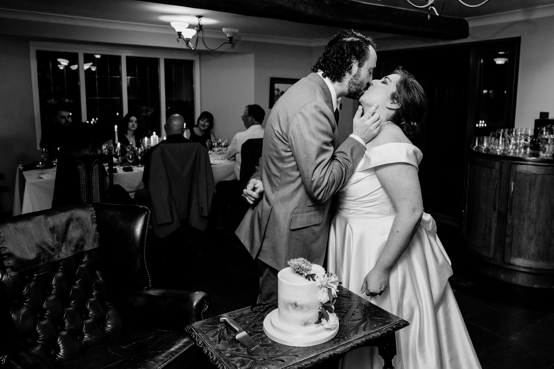 A bride and groom kissing