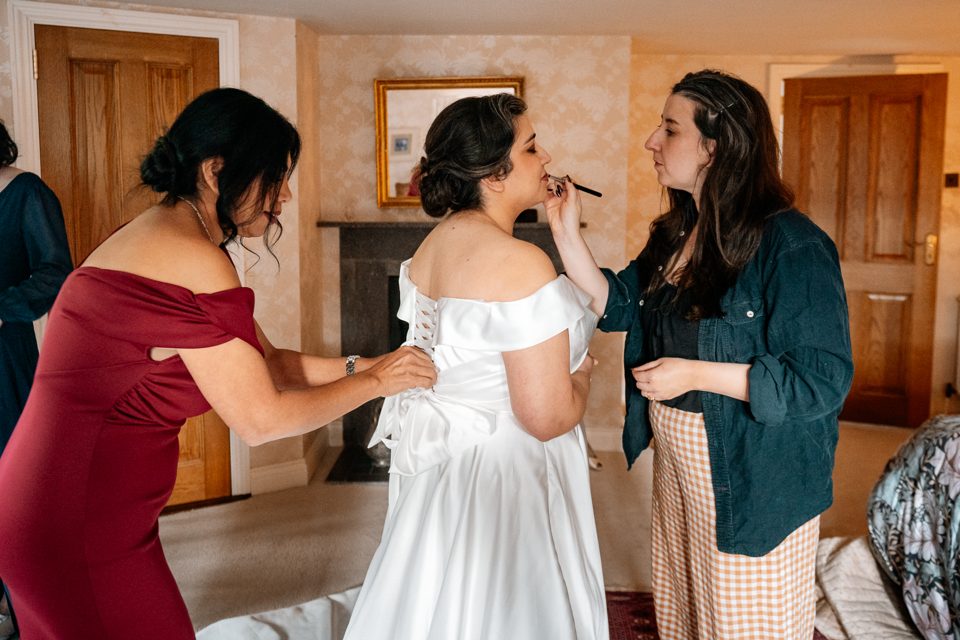 A woman getting her makeup done