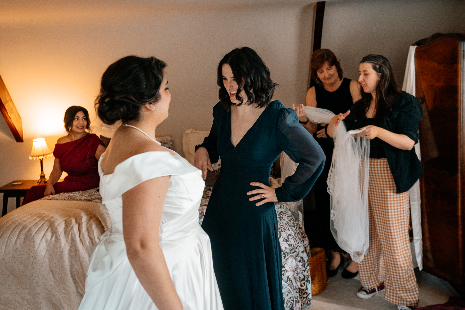 A person in a white dress and a person in a white dress