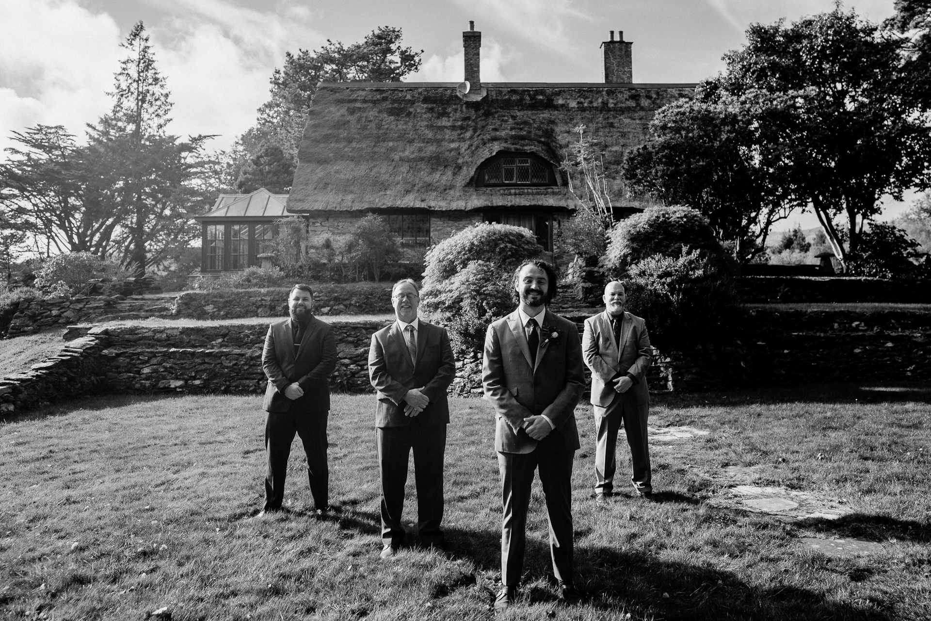 A group of men standing in a field