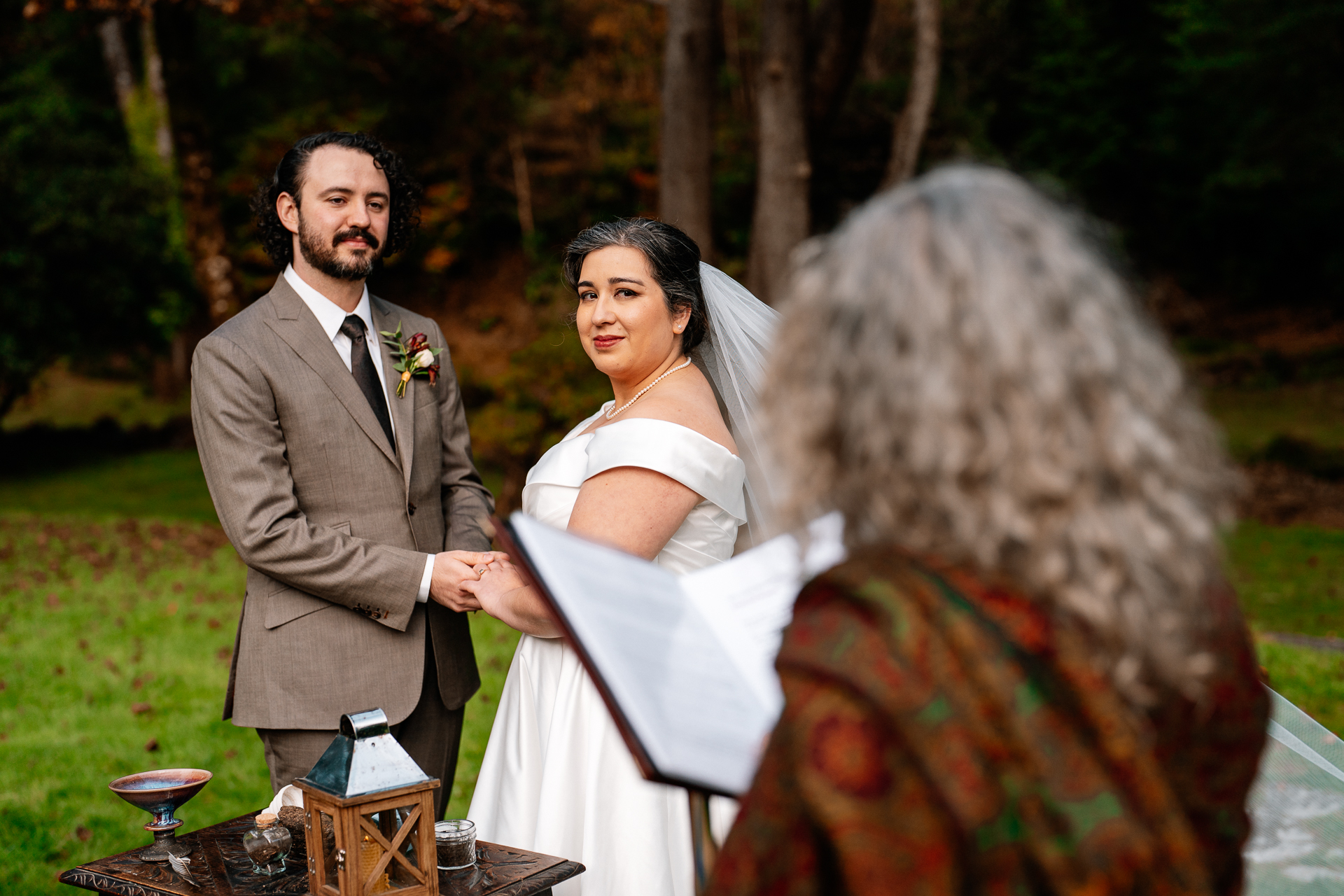 A bride and groom posing for a picture