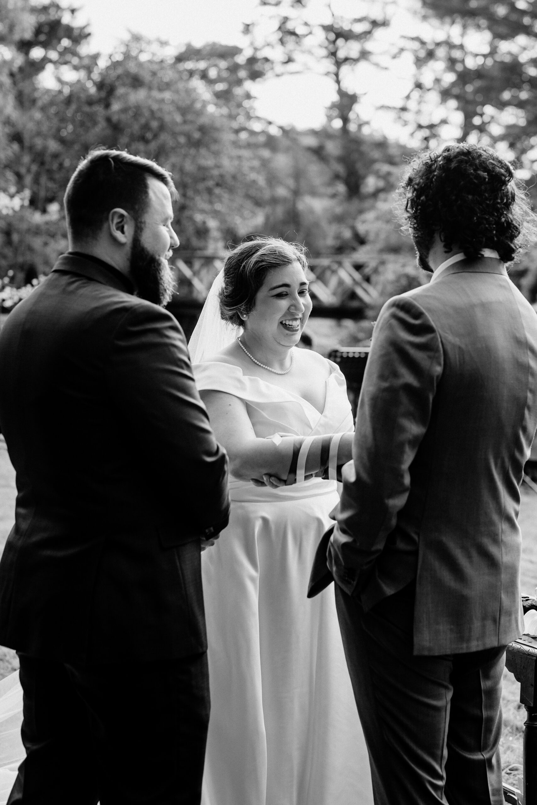 A bride and groom laughing