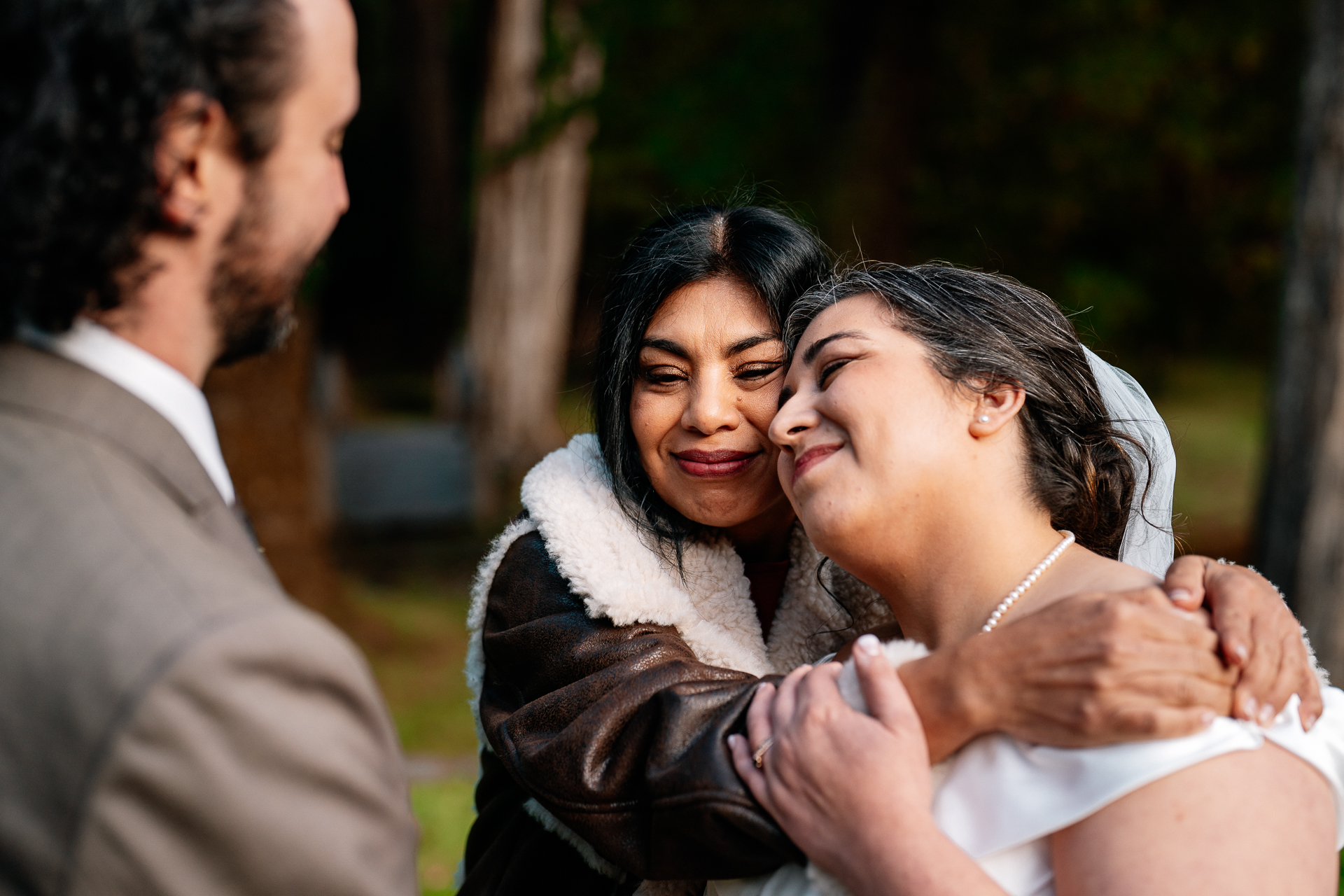 A woman hugging a man