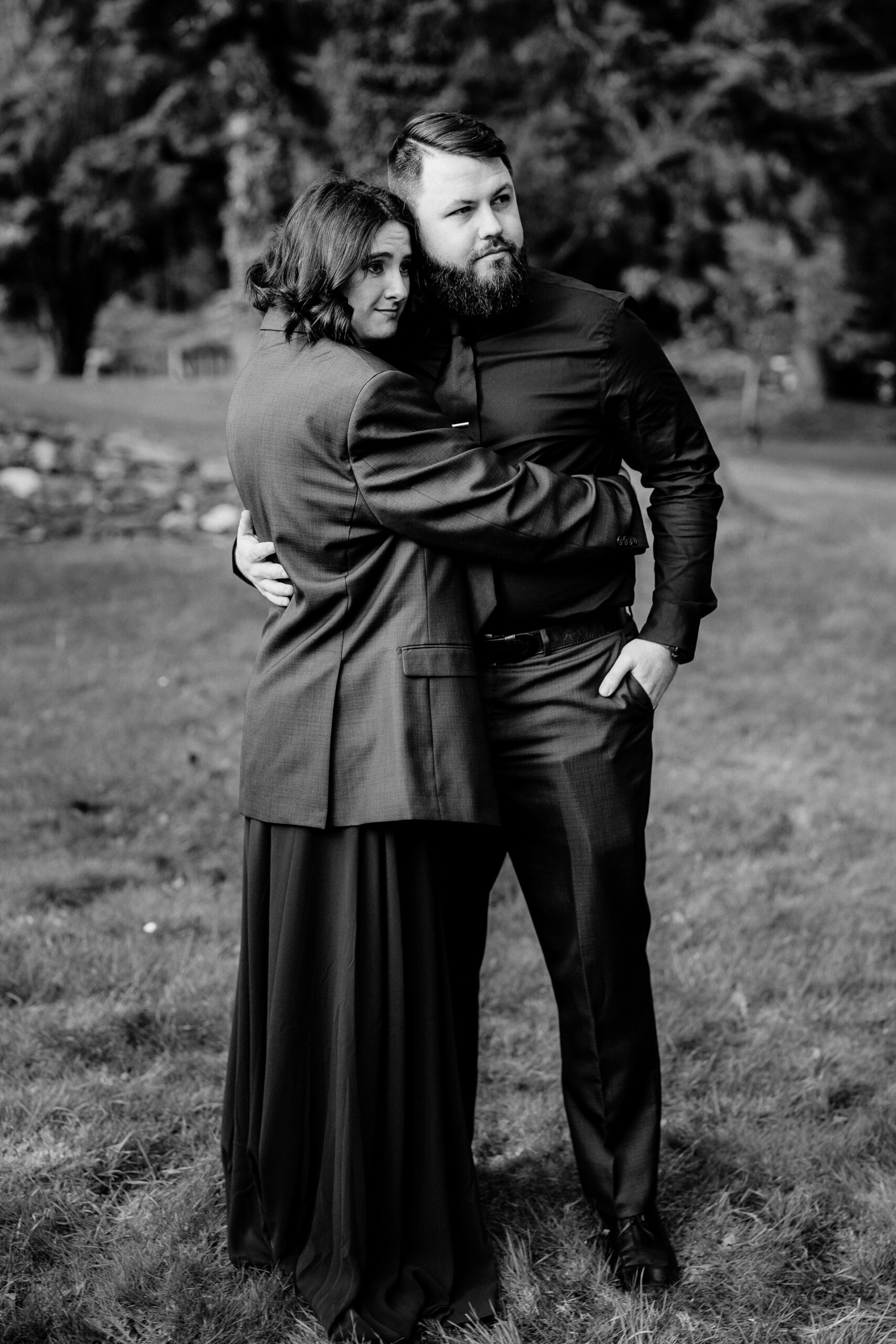 A man and woman posing for a picture