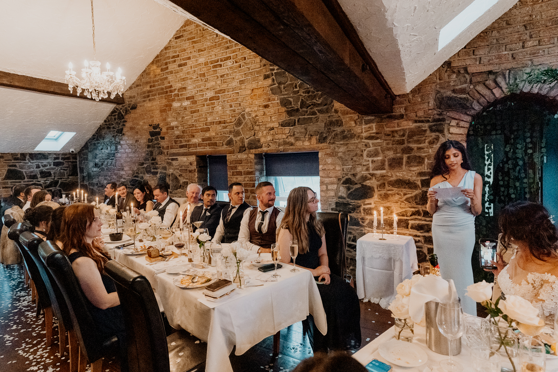 A group of people sitting at tables