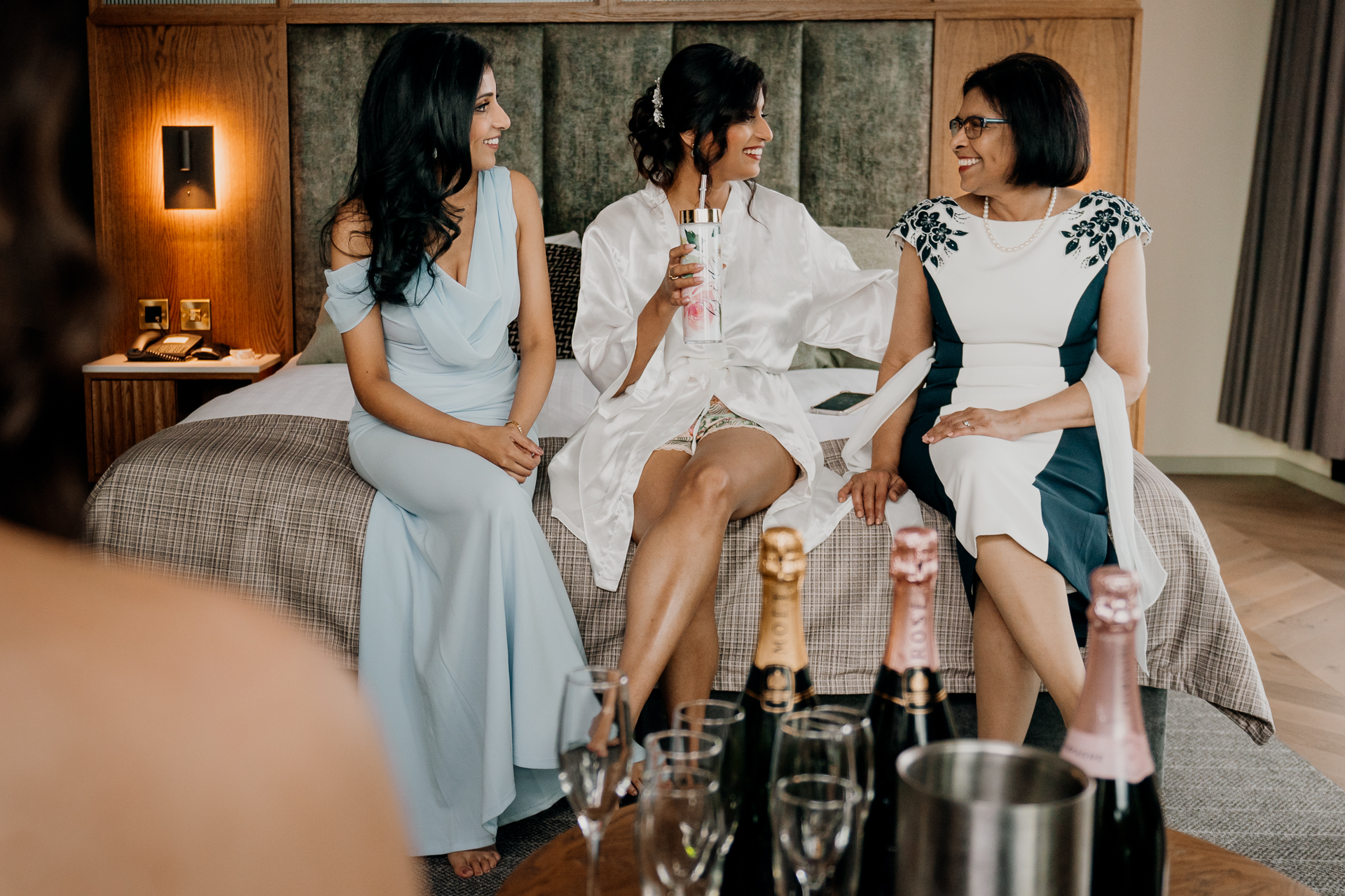 A group of women sitting on a couch