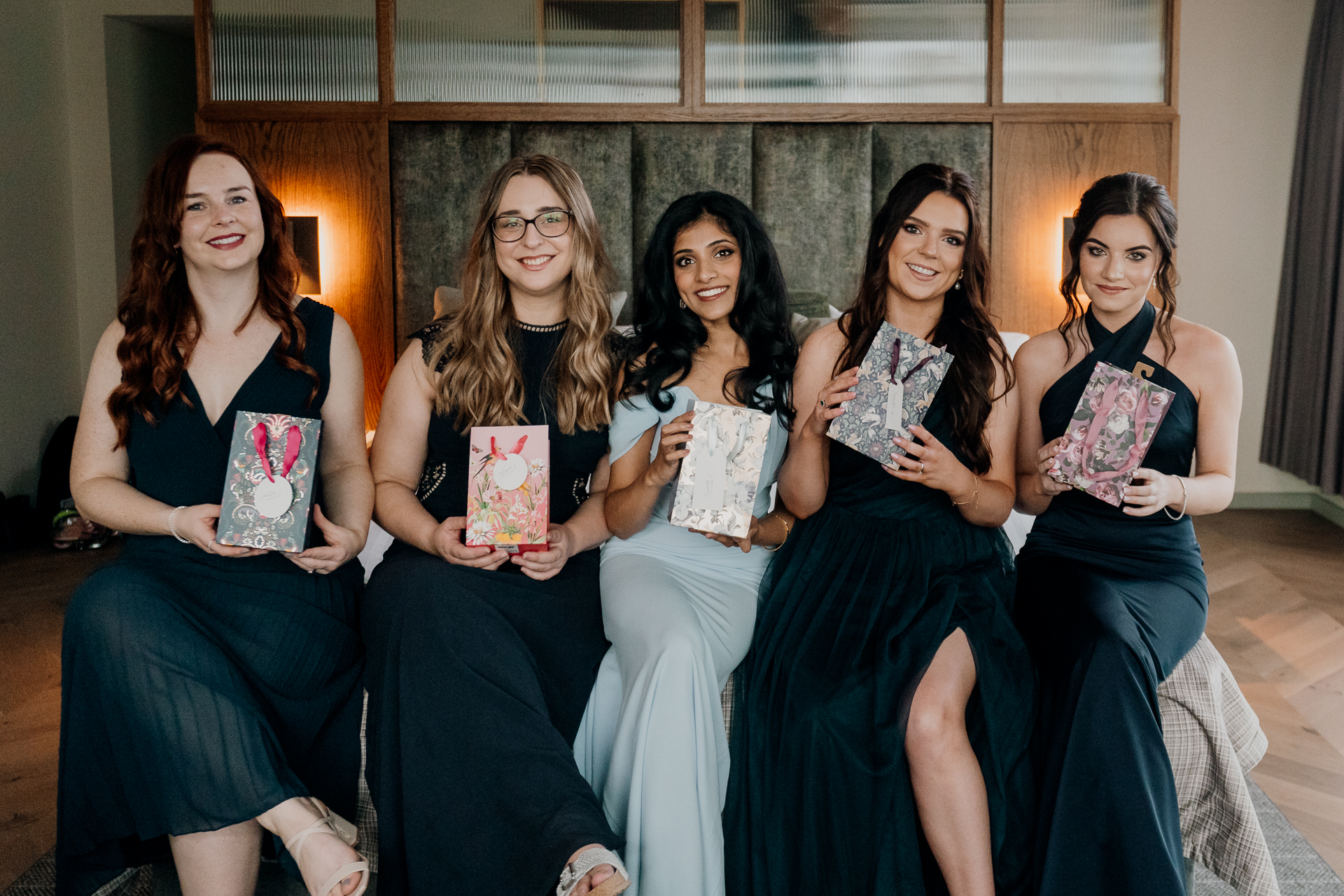 A group of women holding books