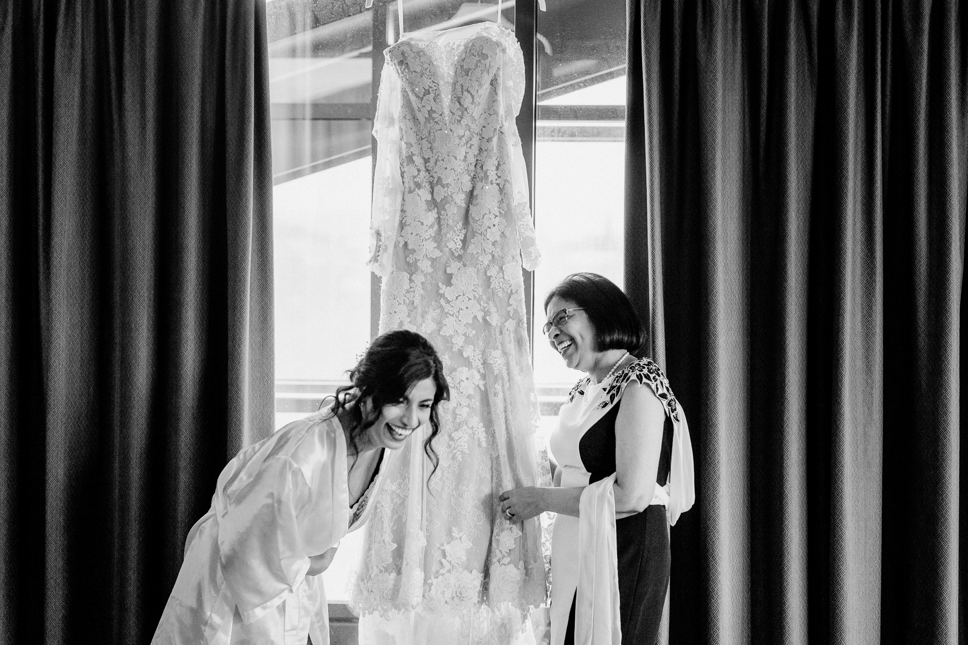 A person getting the wedding dress done