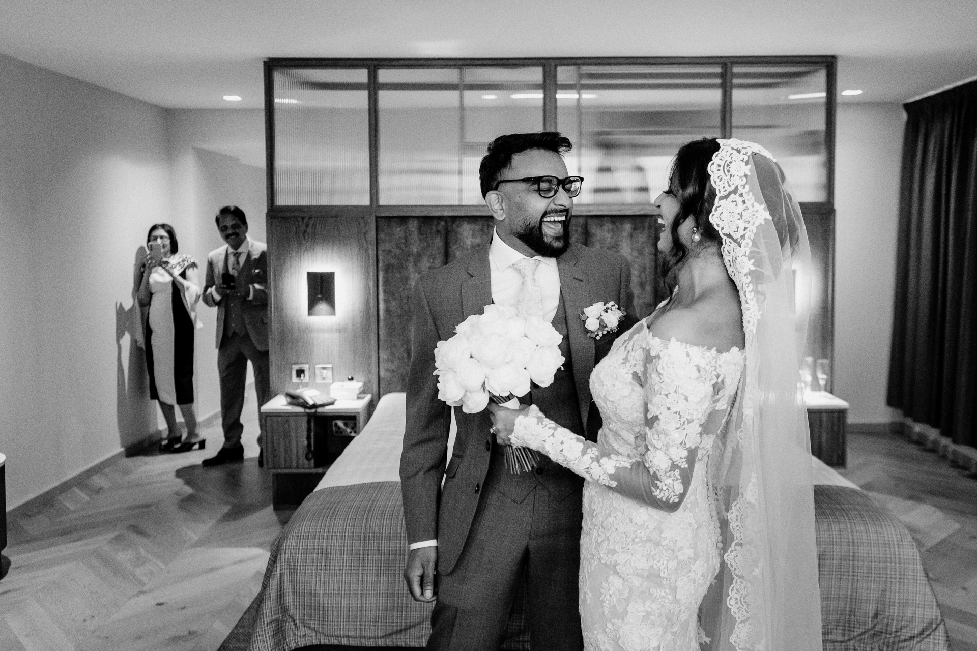 A bride and groom kissing