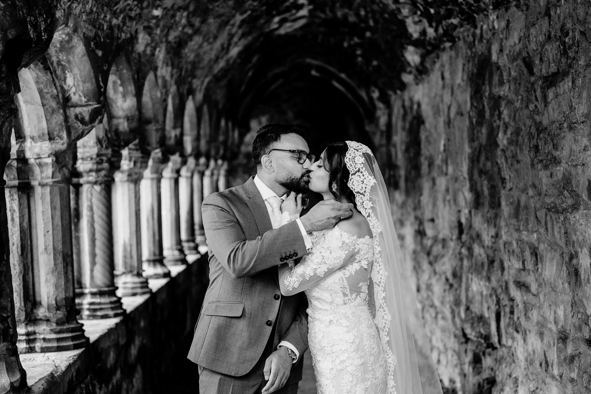 A bride and groom kissing