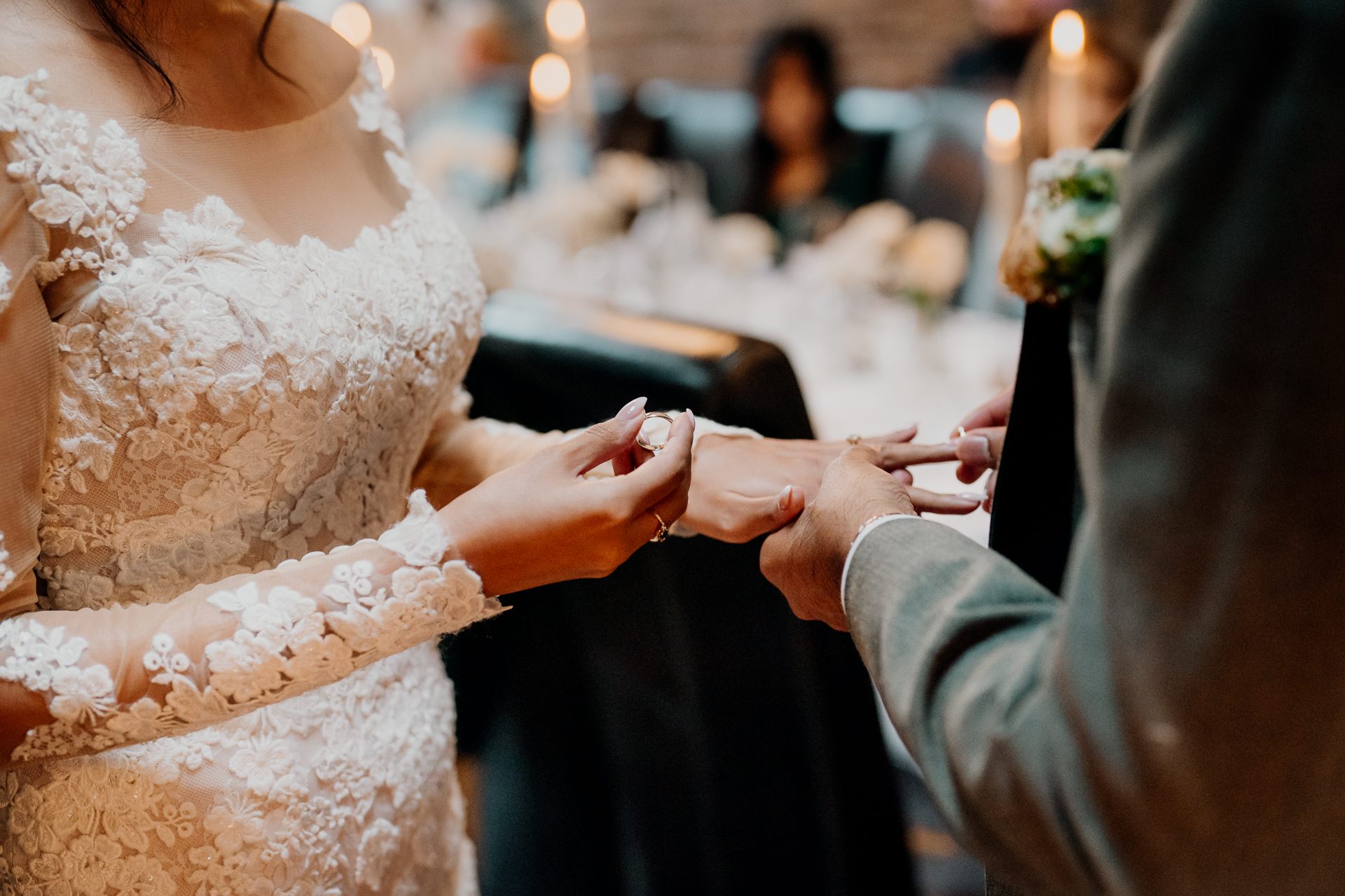 A bride and groom cutting their wedding cake