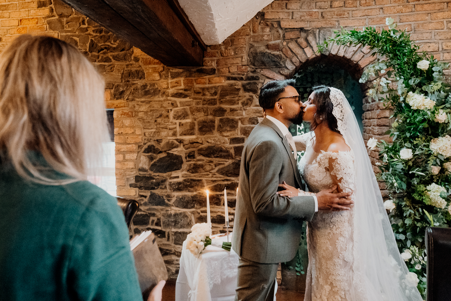 A bride and groom kissing