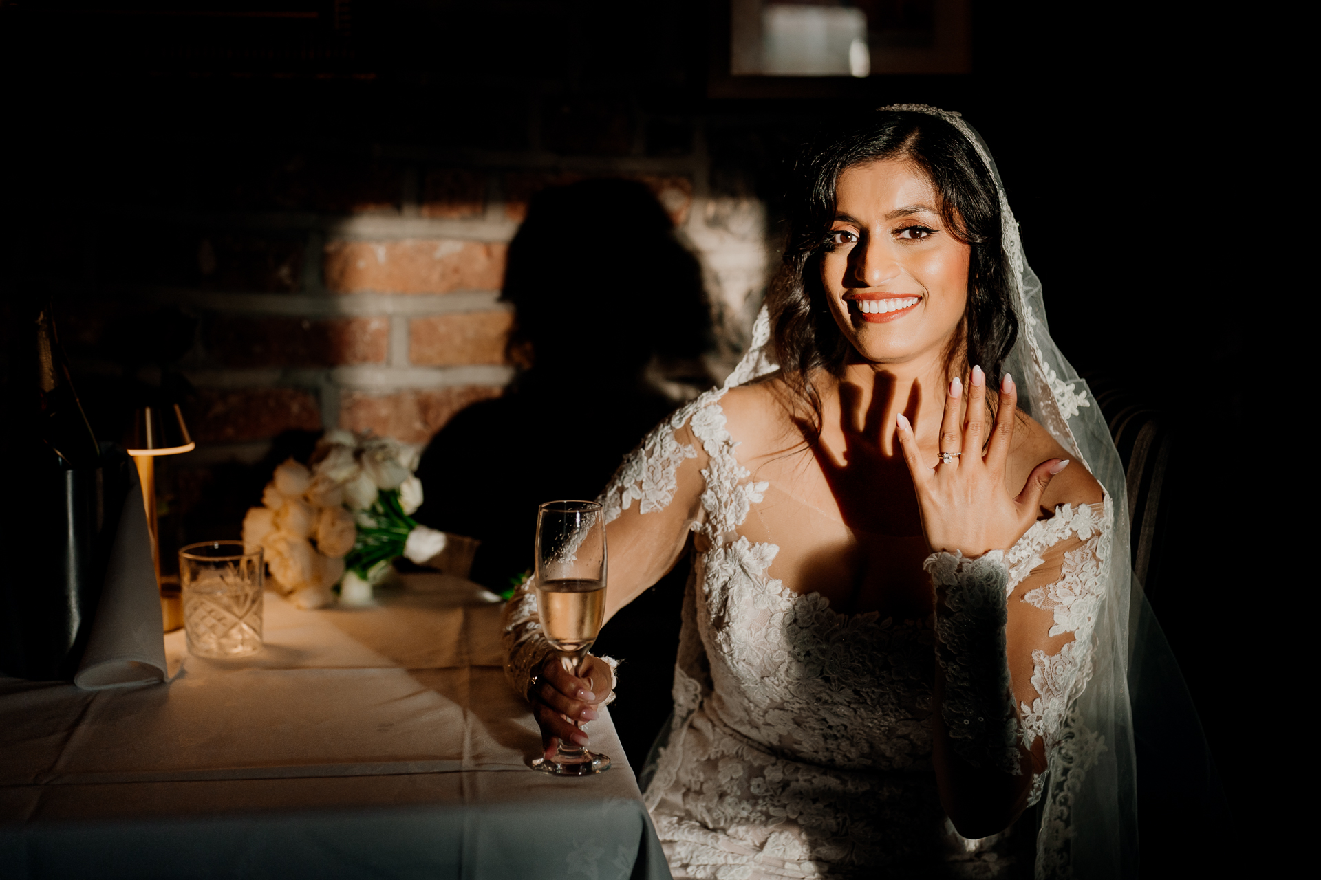 A woman holding a glass of wine