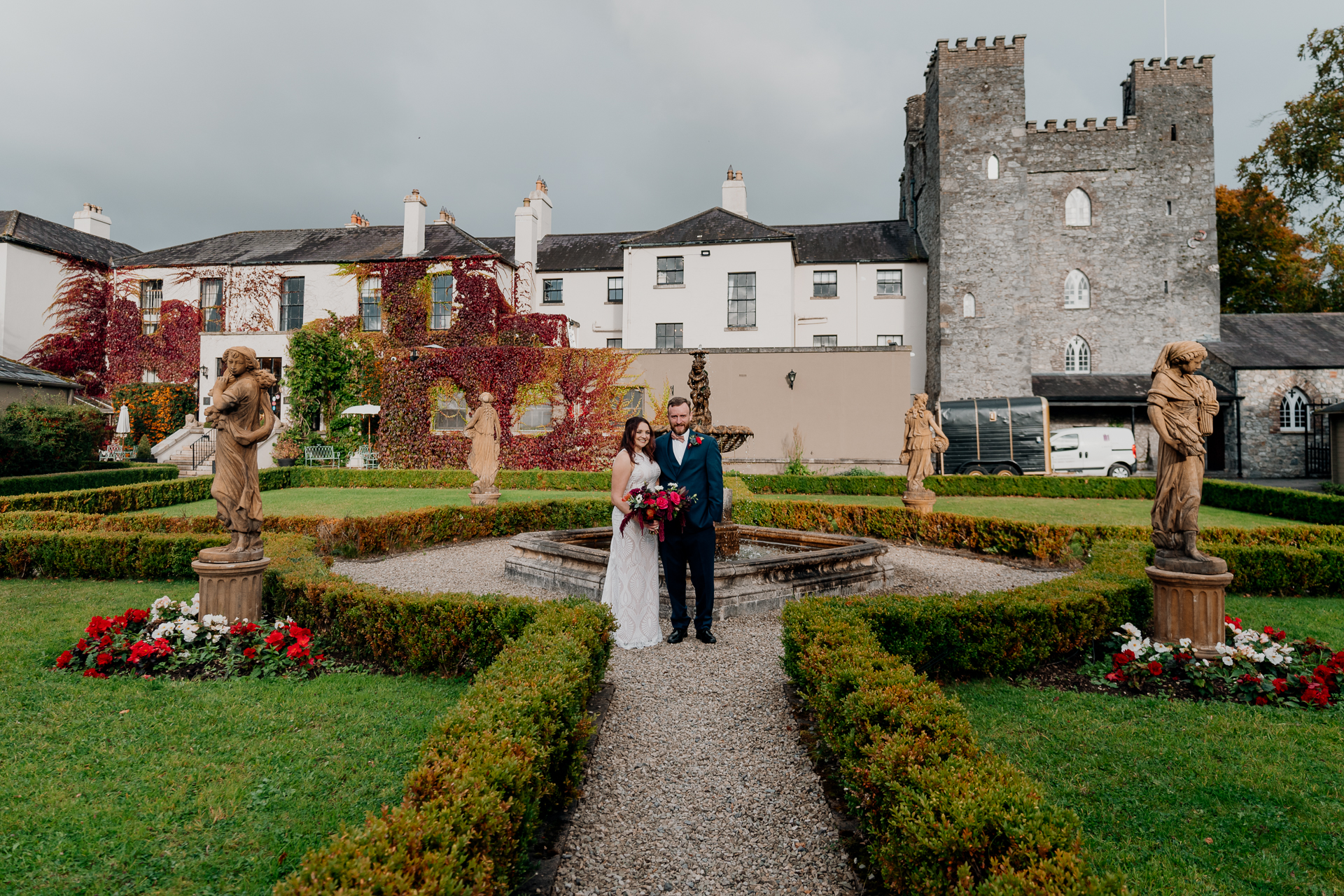 Bride and groom's romantic photo session in the garden of Barberstown Castle.