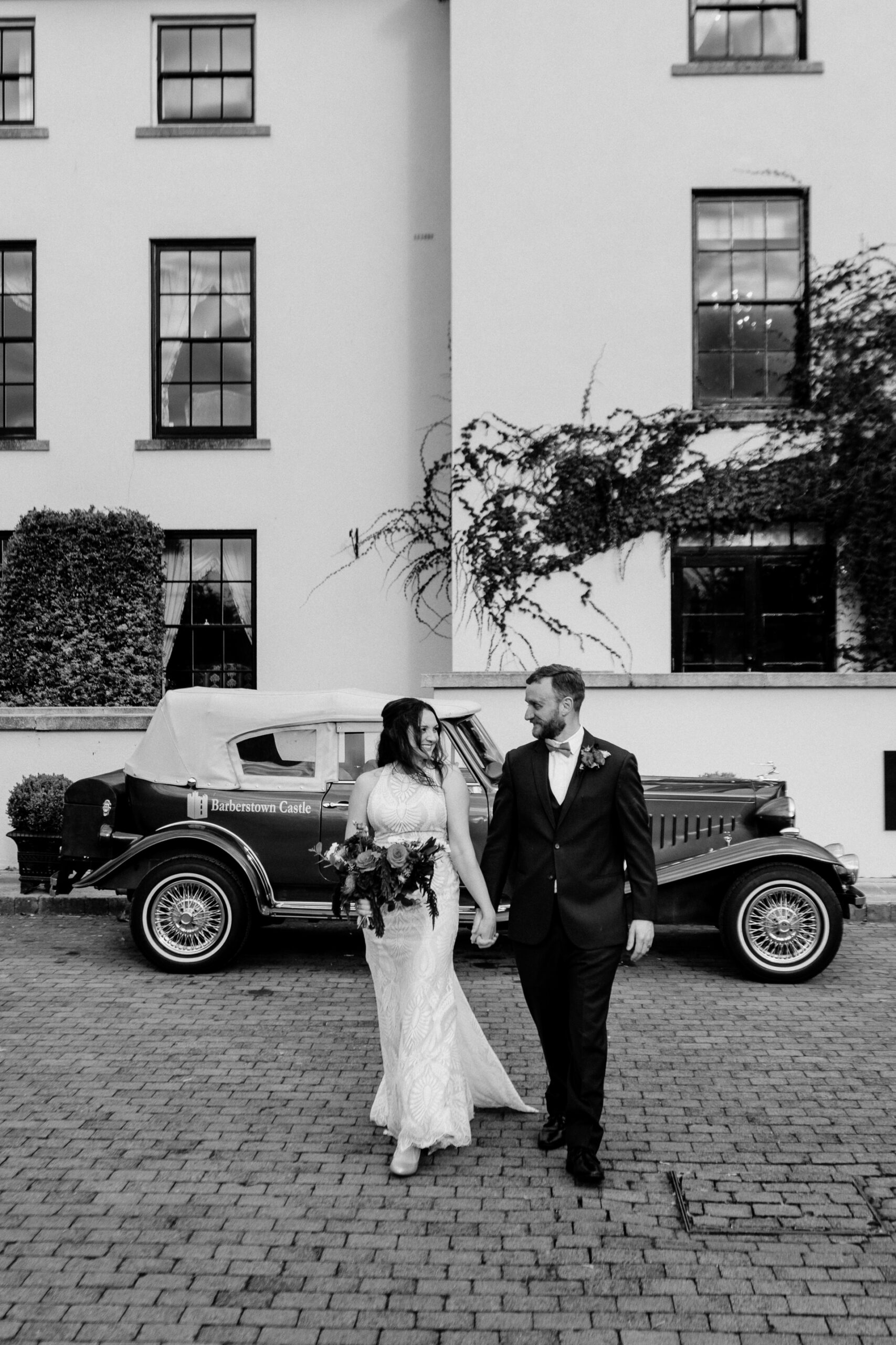 Bride and groom's romantic photo session in the garden of Barberstown Castle.