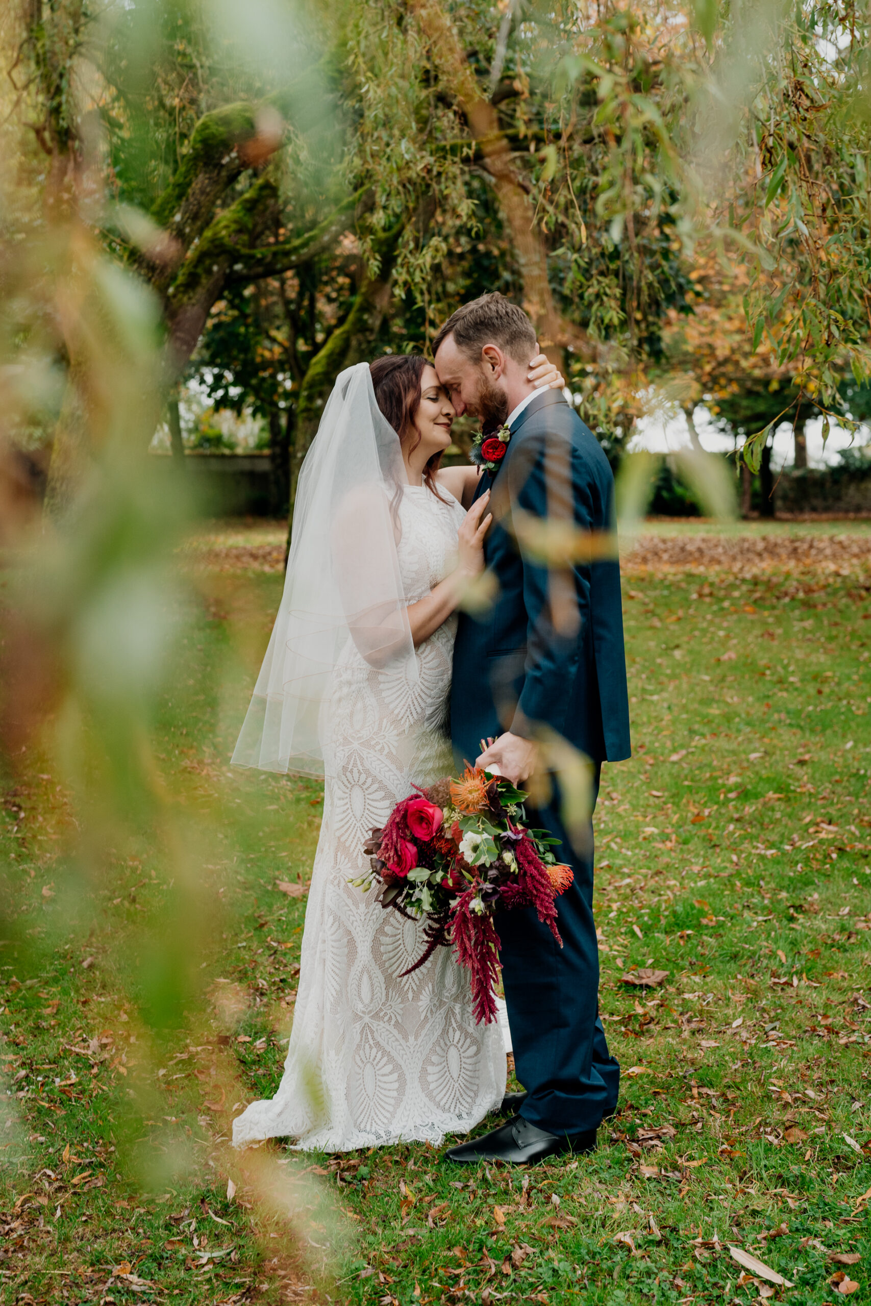 Bride and groom's romantic photo session in the garden of Barberstown Castle.