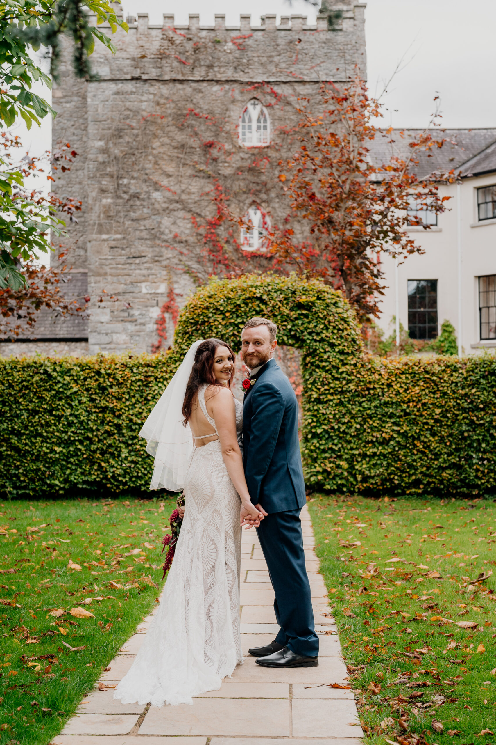 Bride and groom's romantic photo session in the garden of Barberstown Castle.